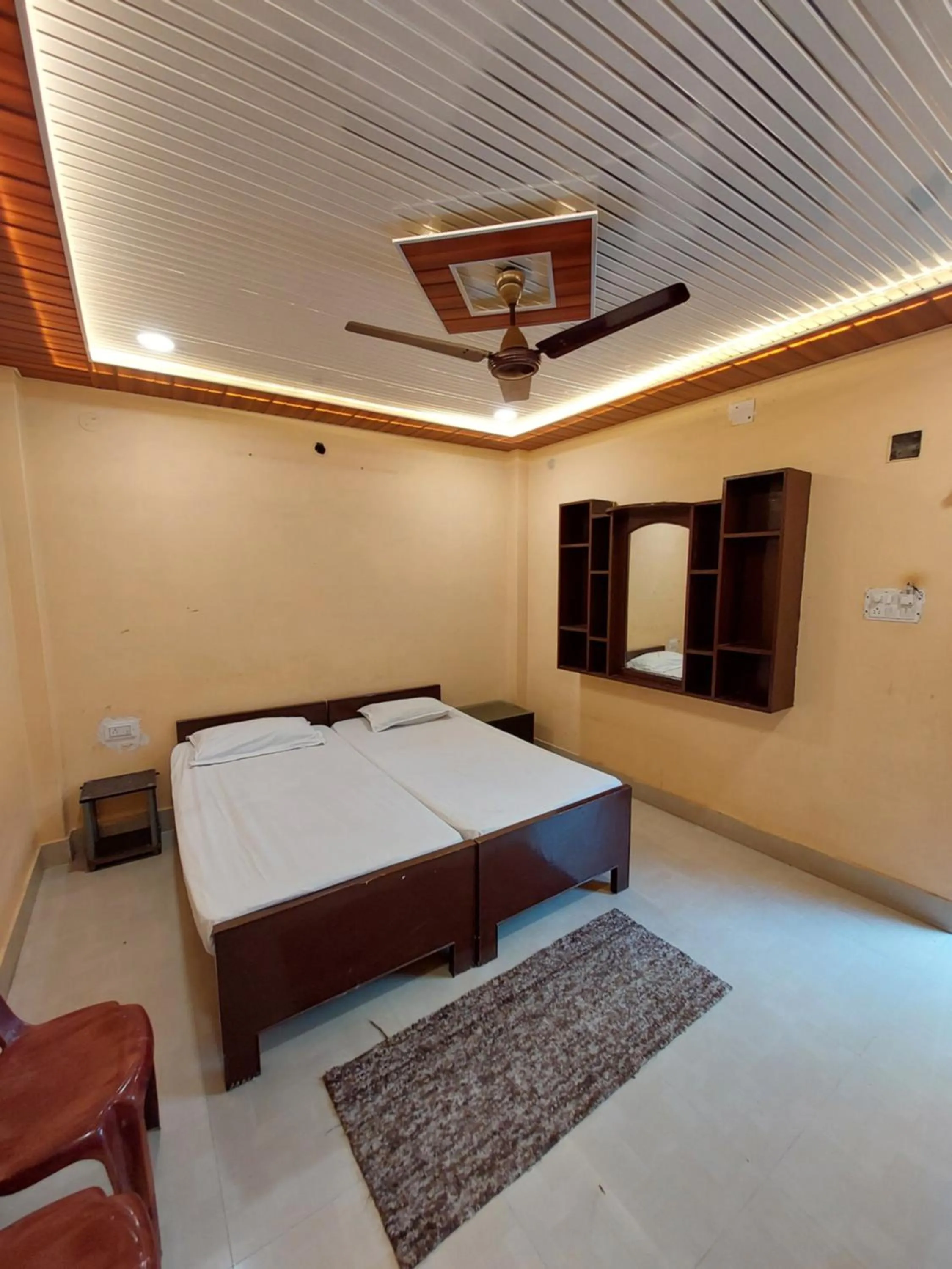 Bedroom in Teerth Guest House