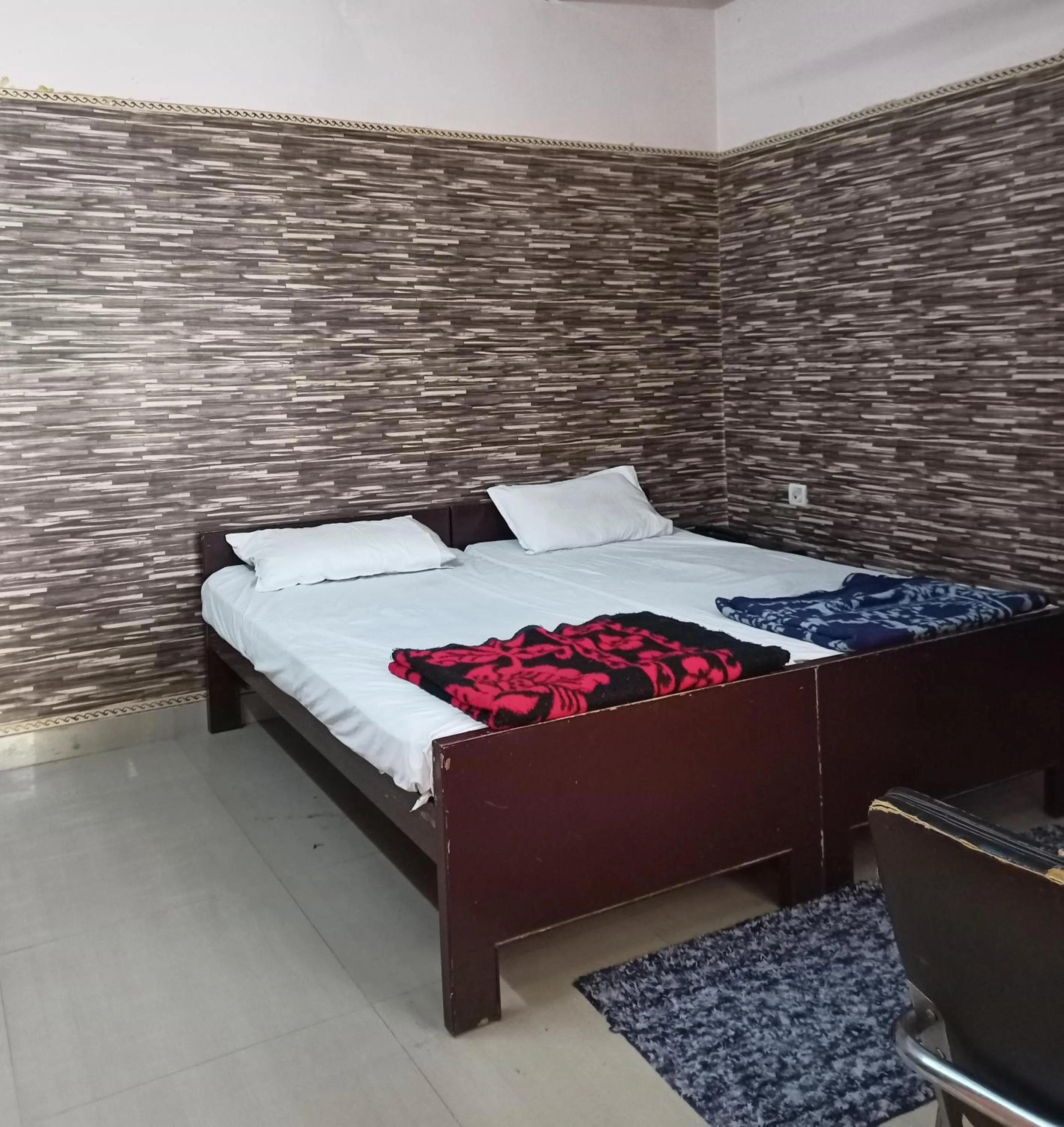 Bedroom in Teerth Guest House