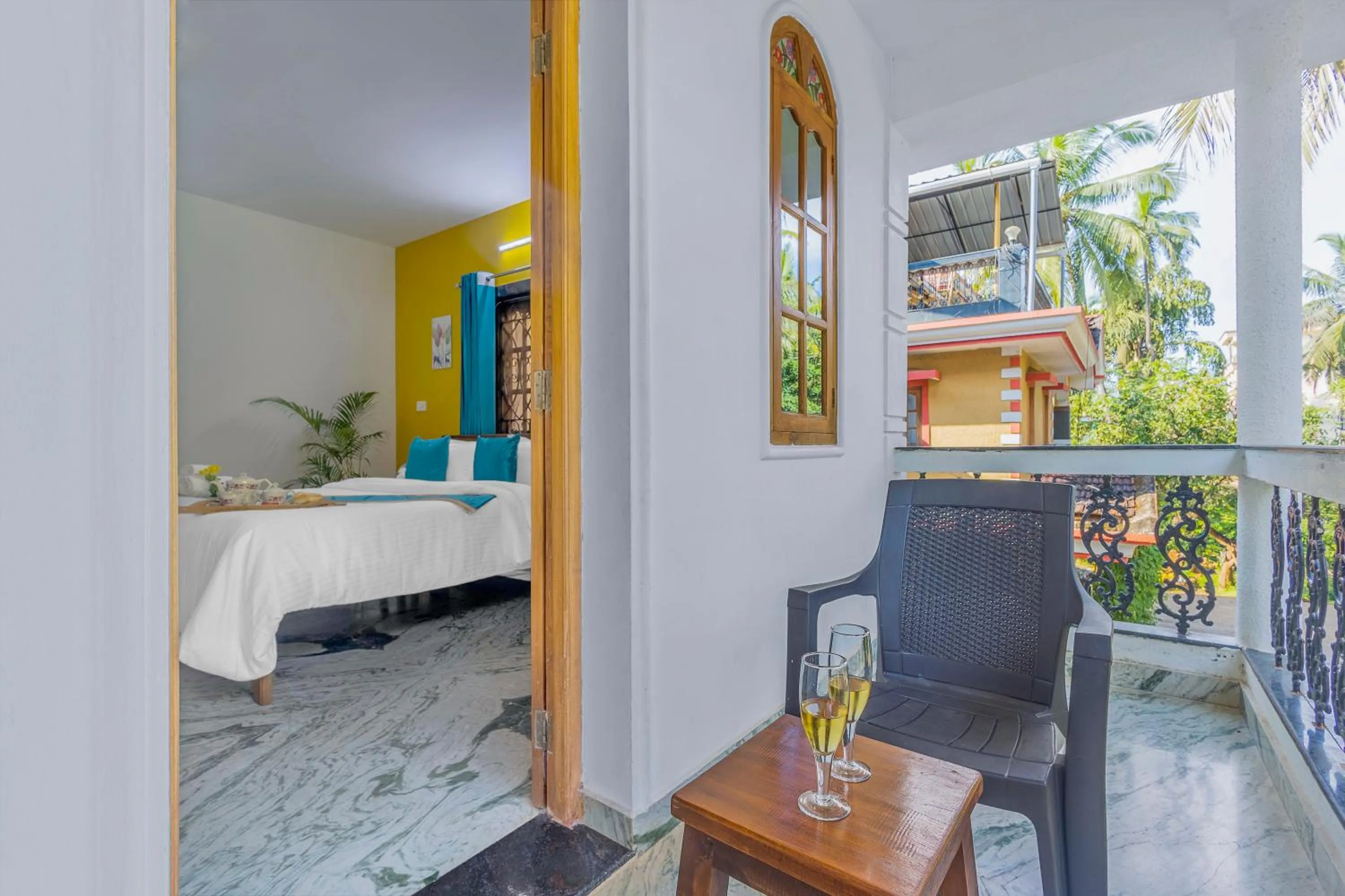 Seating area, Bed in The Sequeira Goa