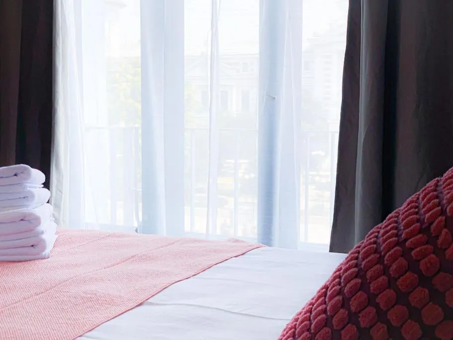 Bed in Chic Urbana: 140sqm 5-Bedroom Downtown Gem