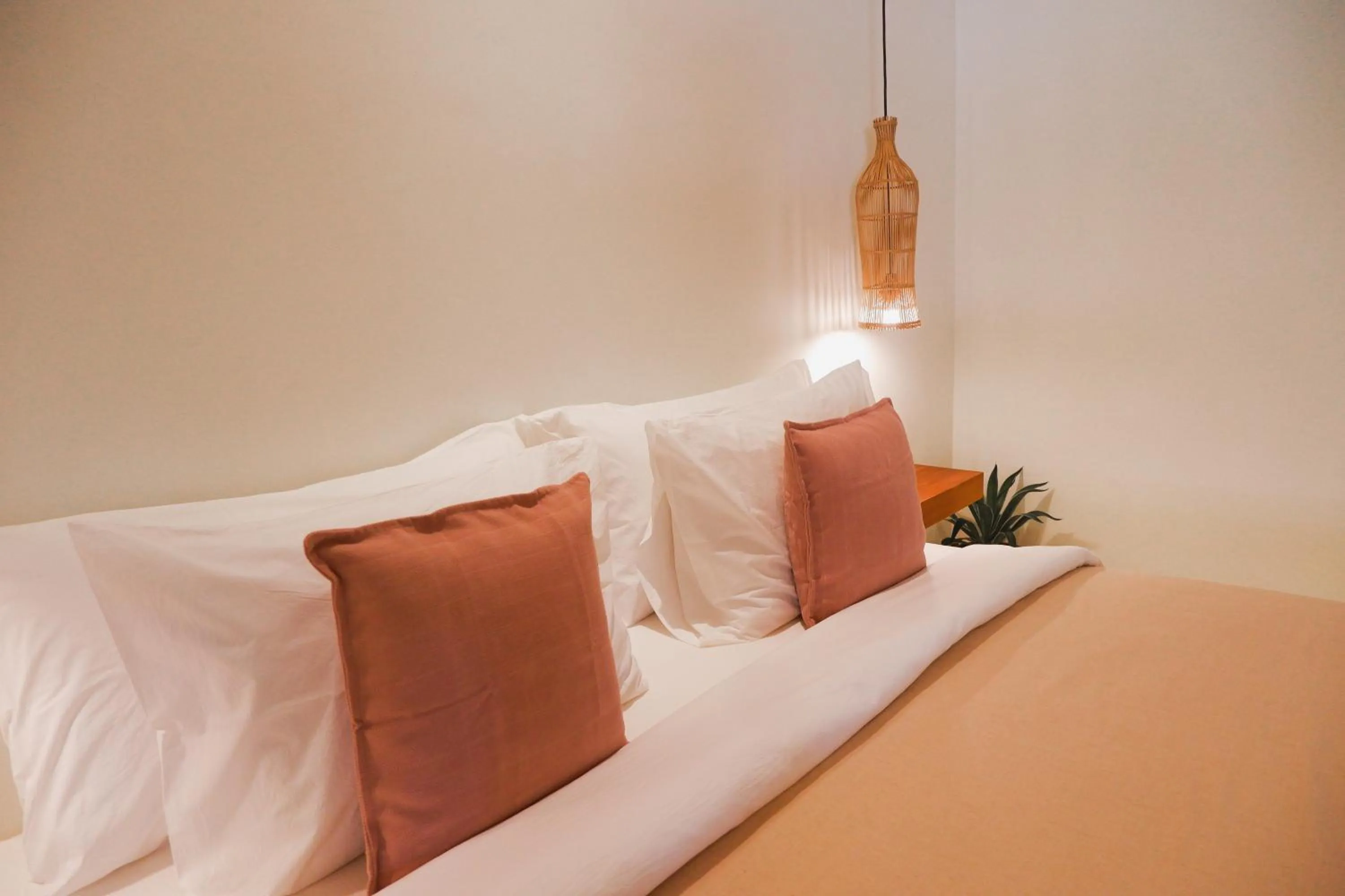 Bed in Reset Lombok Hotel