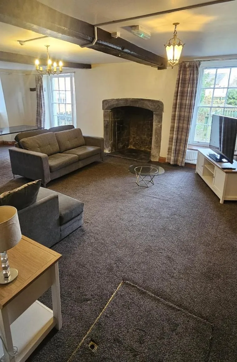 Communal lounge/ TV room in Plas Bellin Hall
