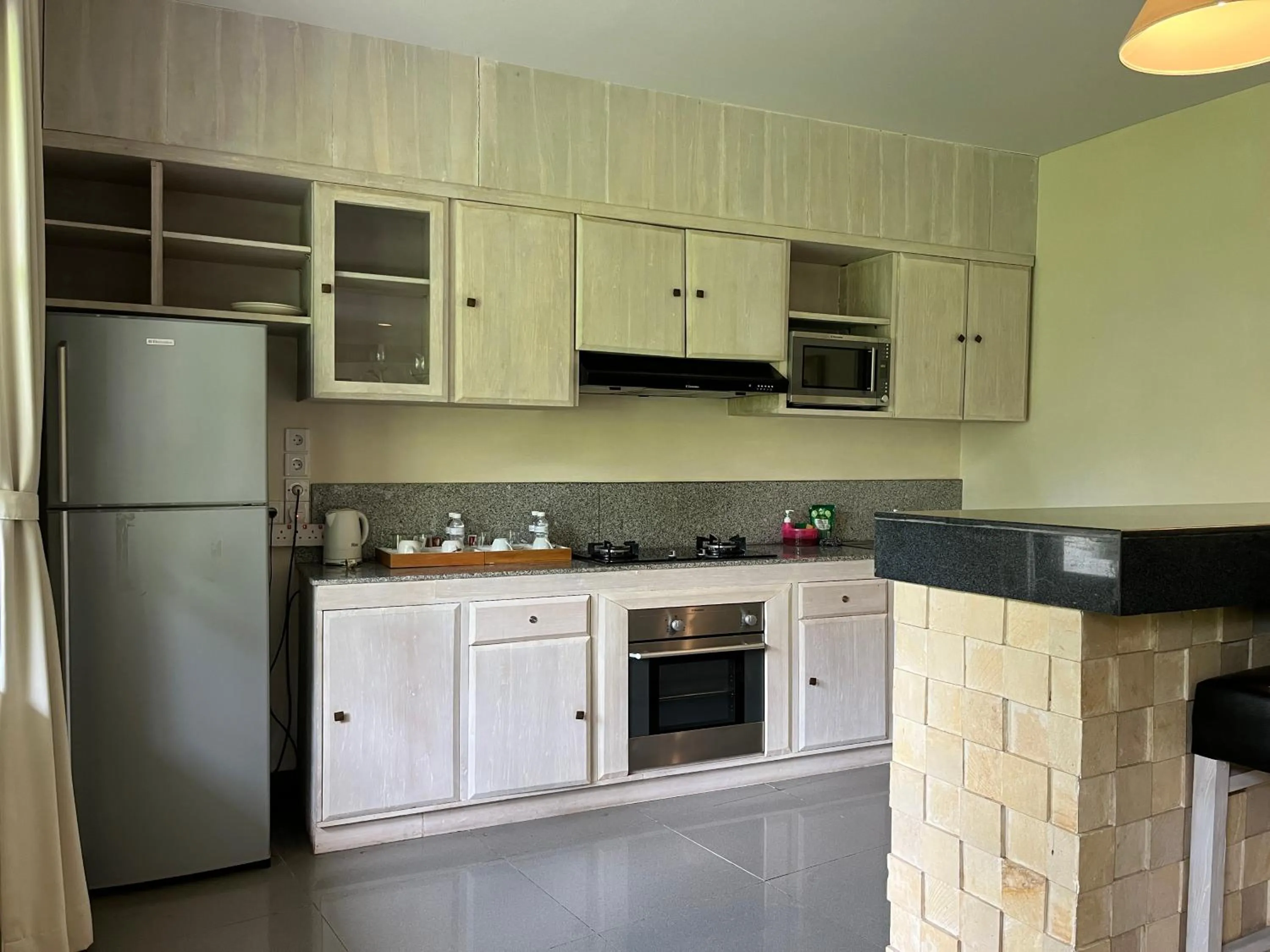 Kitchen or kitchenette in Labak River Hotel by EPS