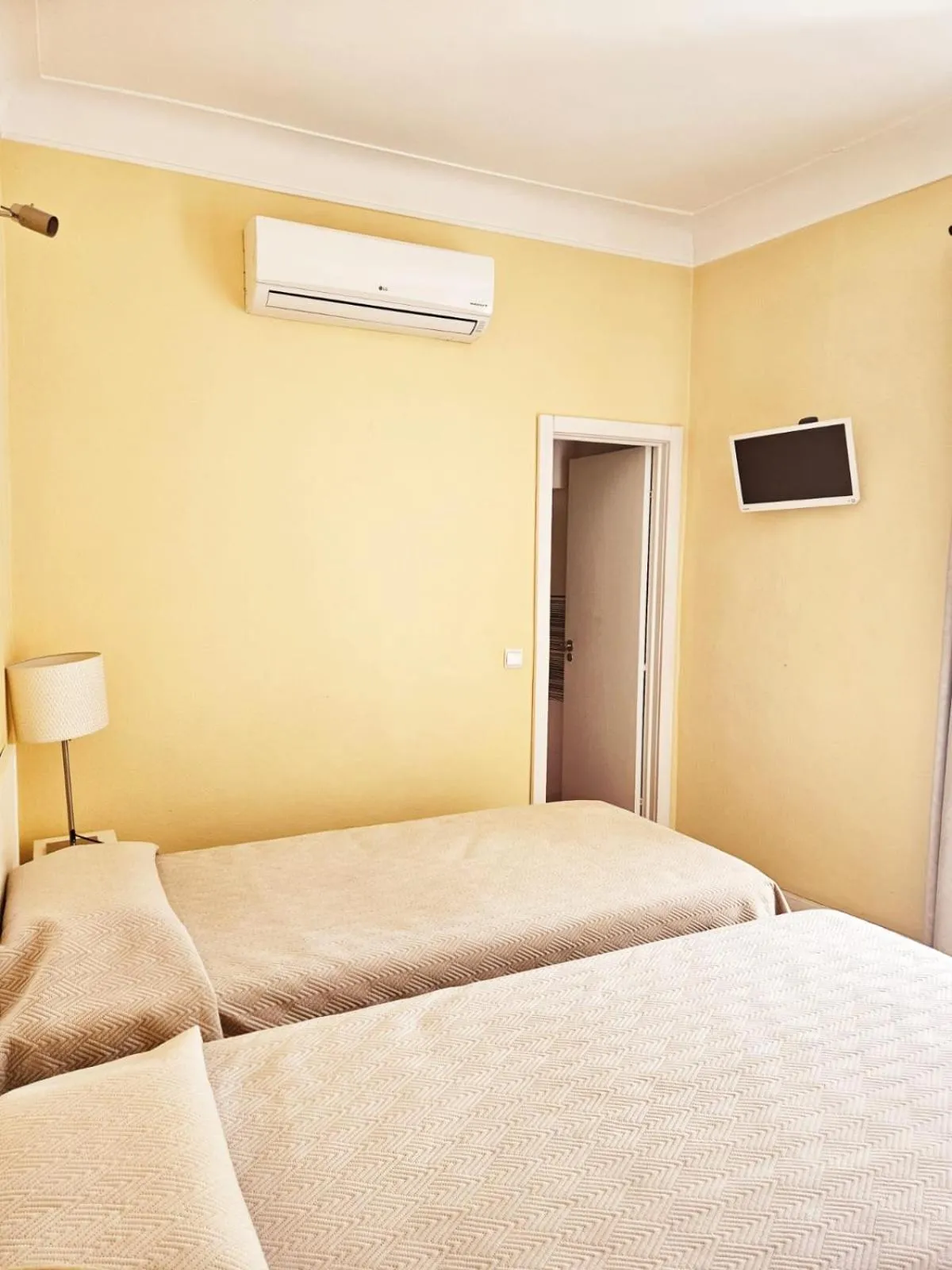 Bed in Alcamim Guesthouse