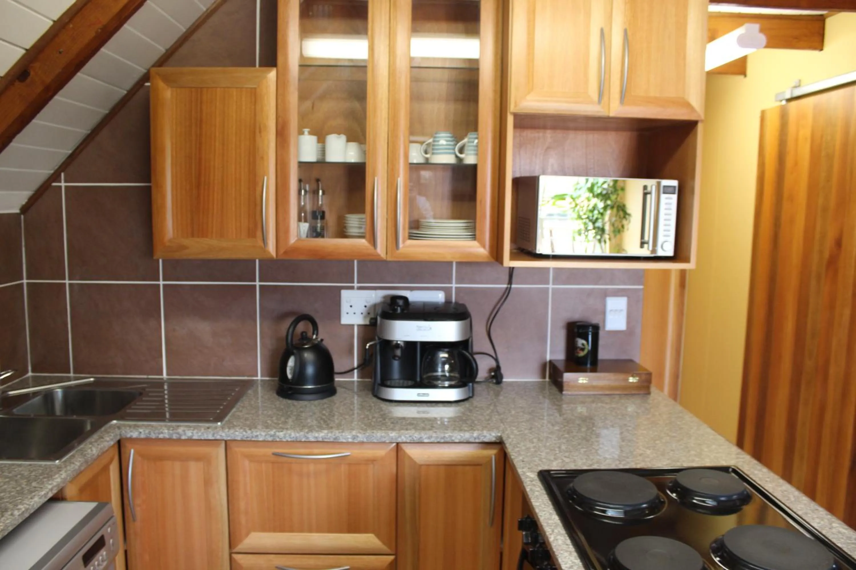 Kitchen or kitchenette in Emzini Apartments