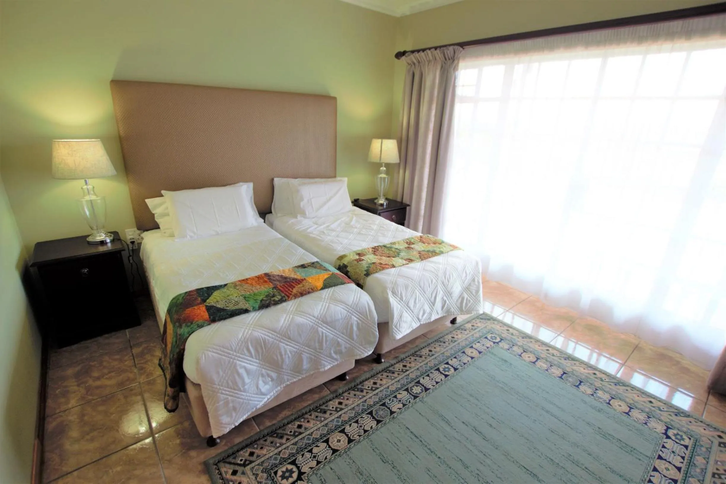 Bed in Emzini Apartments