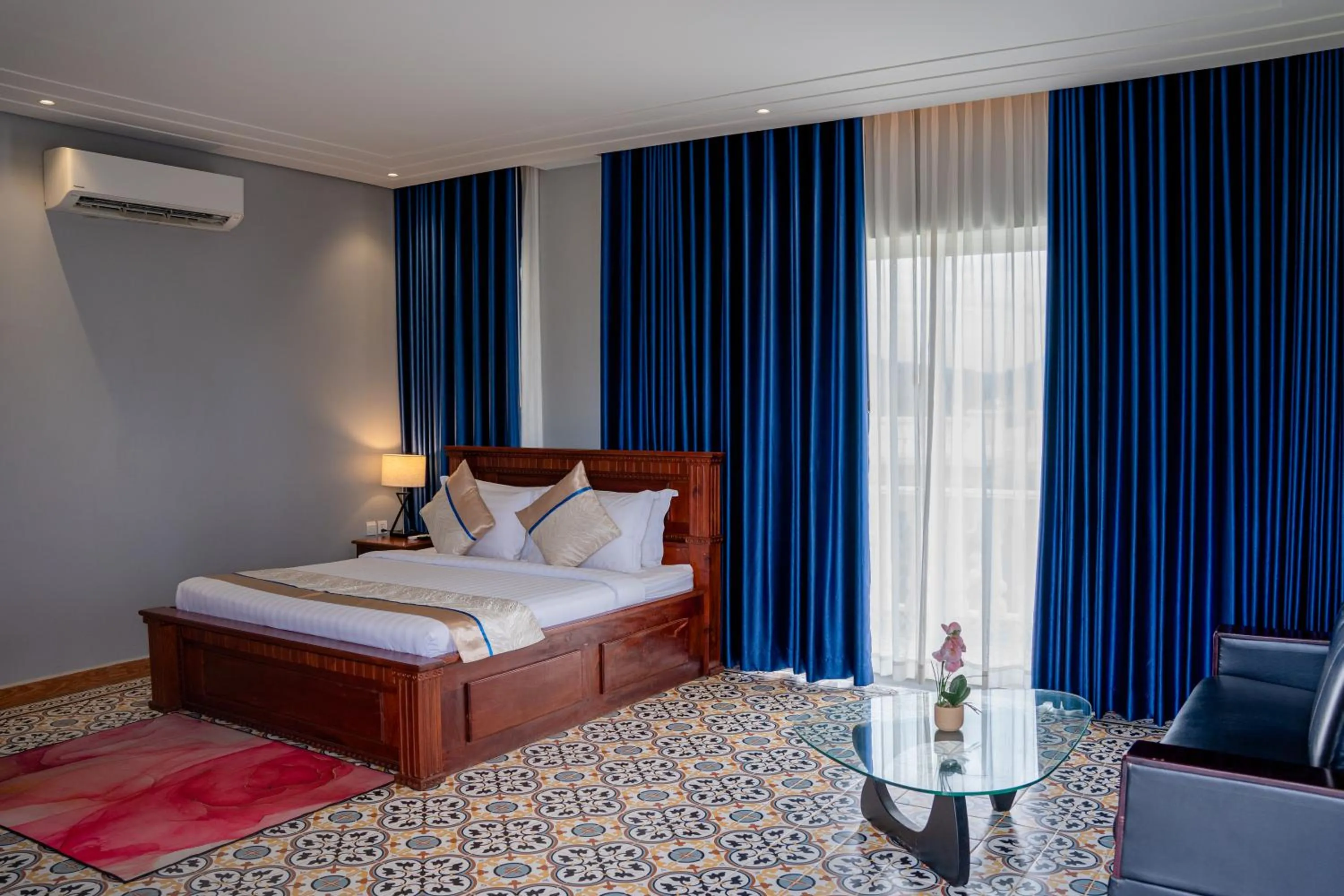 Bed in Sokchea Kampot Hotel