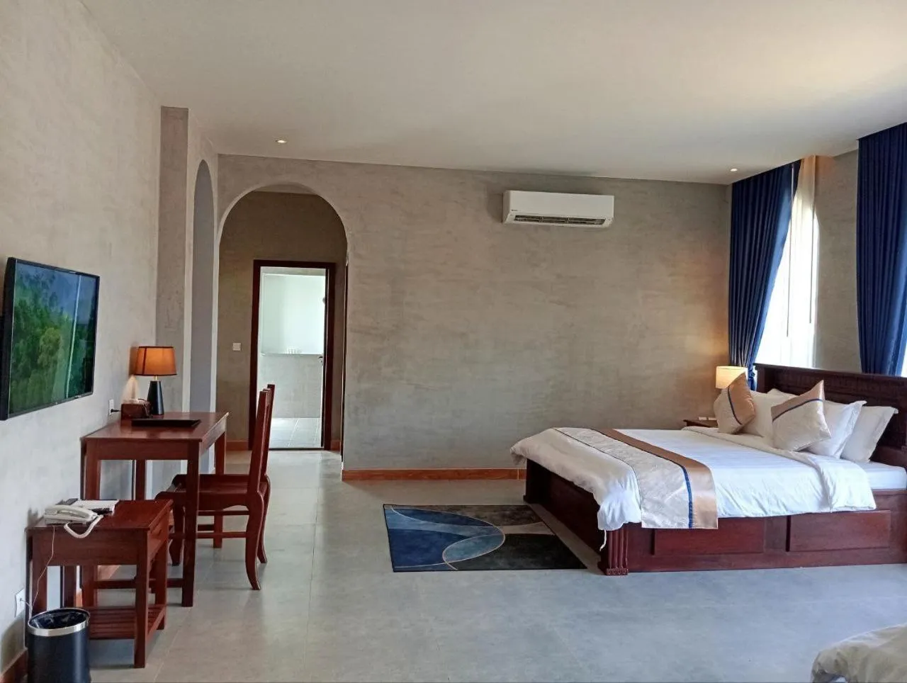 Bed in Sokchea Kampot Hotel