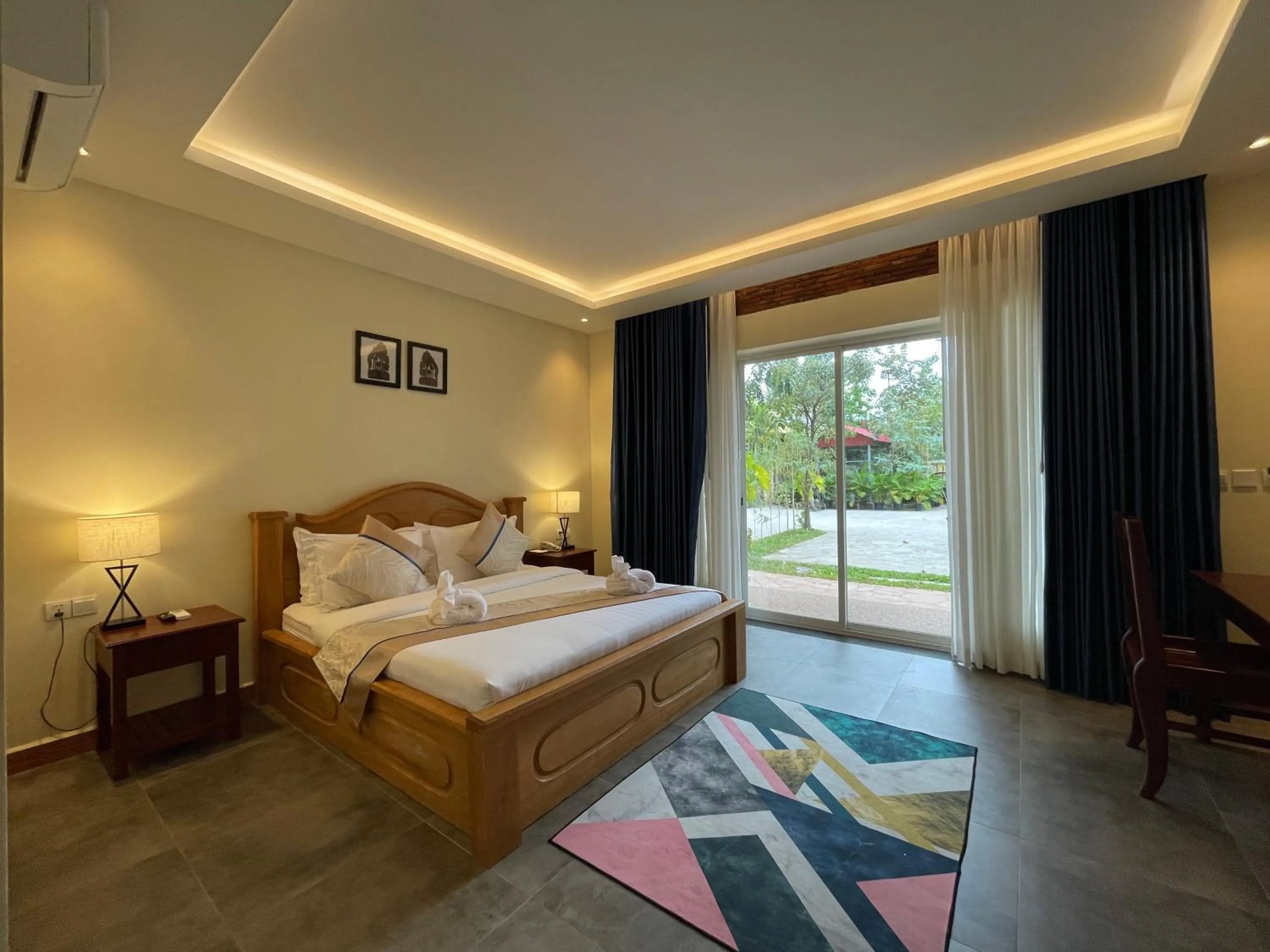 Bed in Sokchea Kampot Hotel