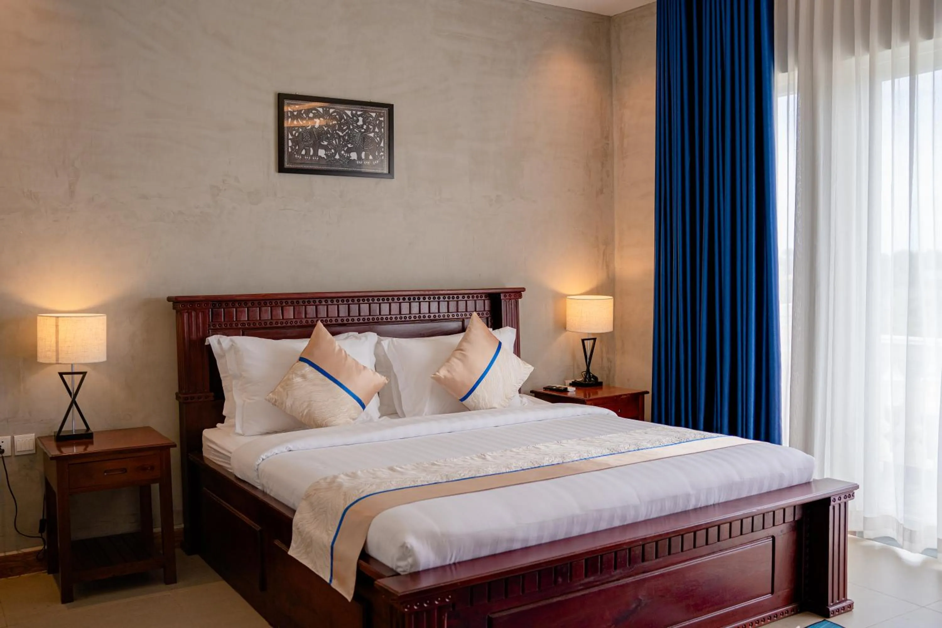 Bed in Sokchea Kampot Hotel