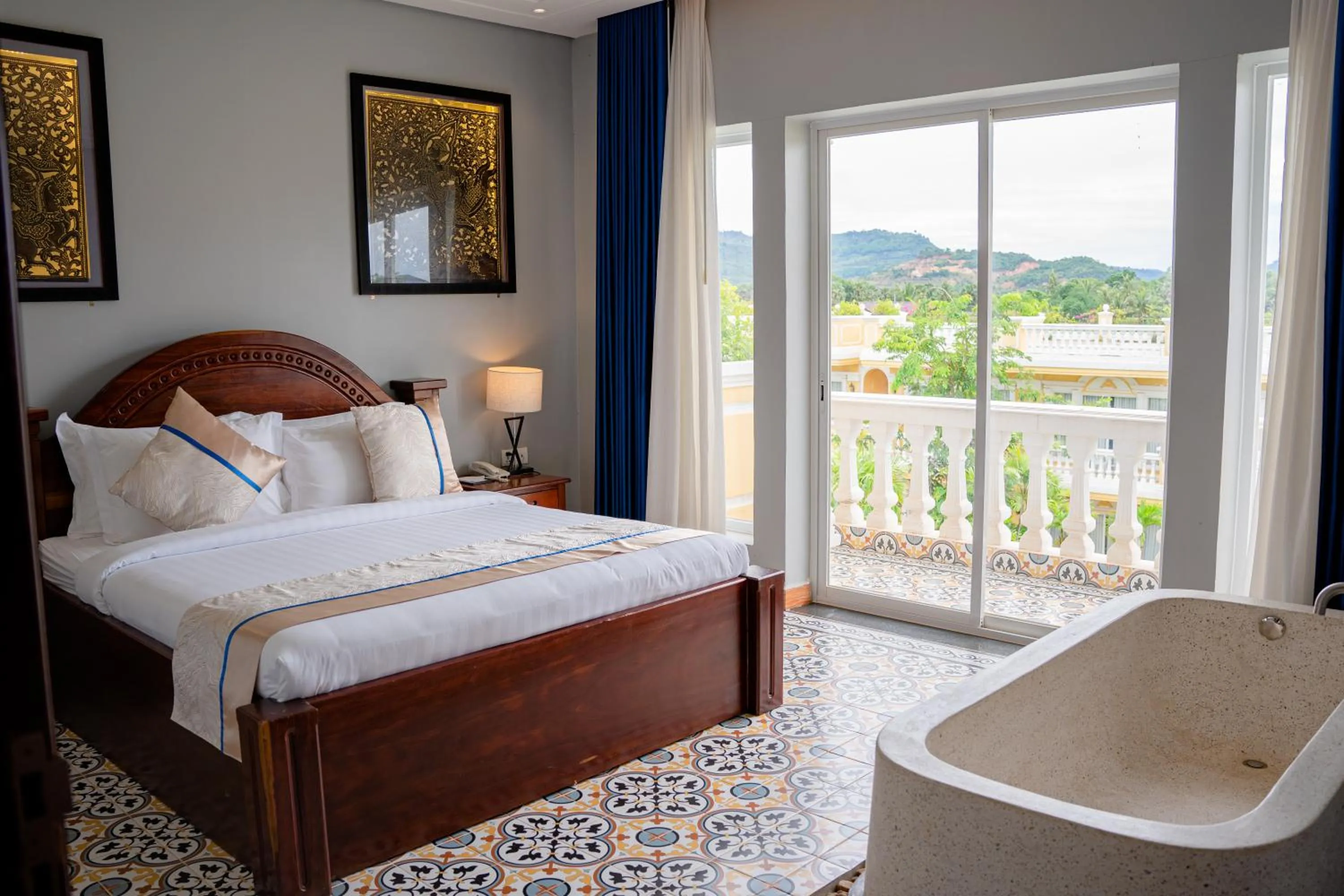 Bed in Sokchea Kampot Hotel