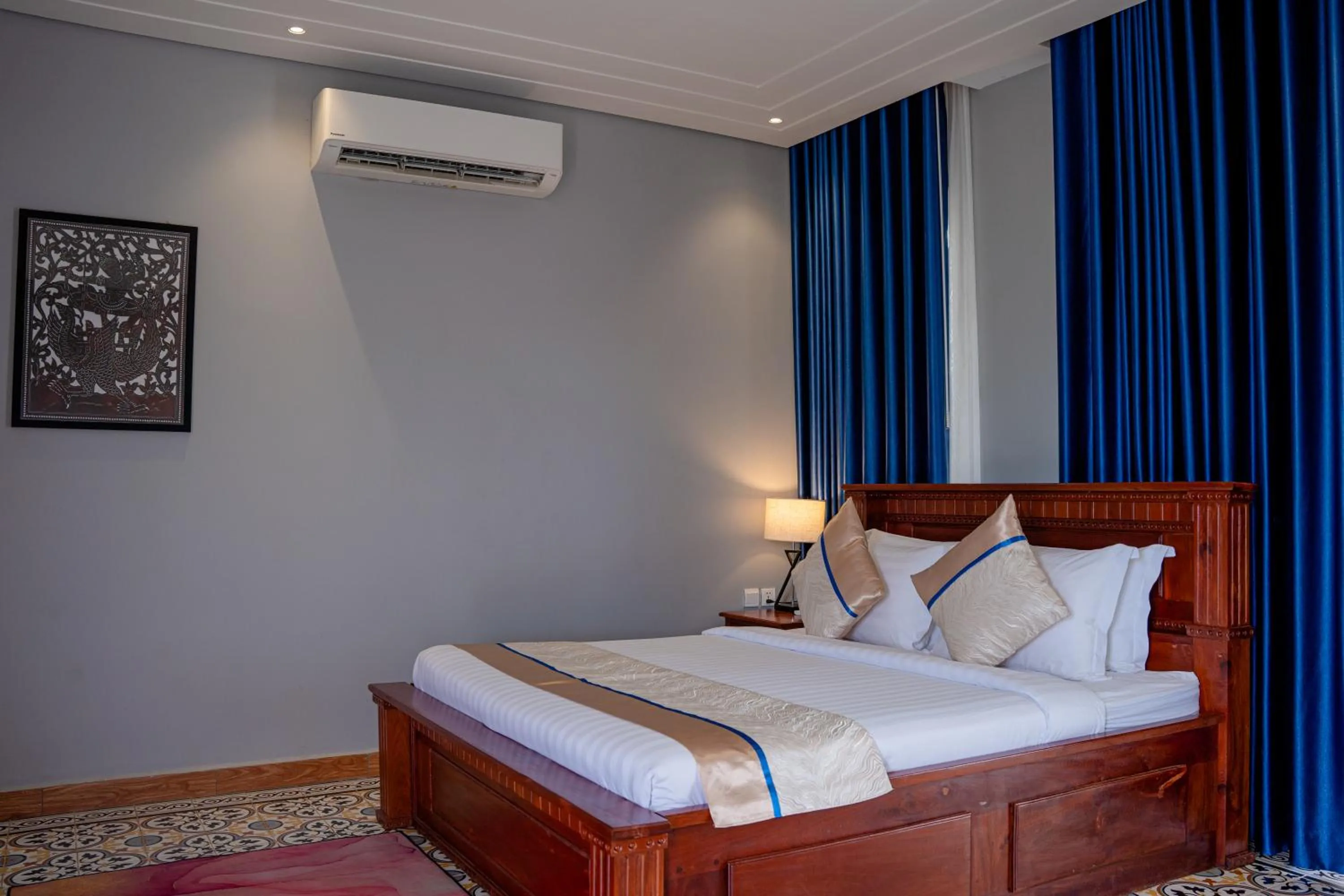 Bed in Sokchea Kampot Hotel