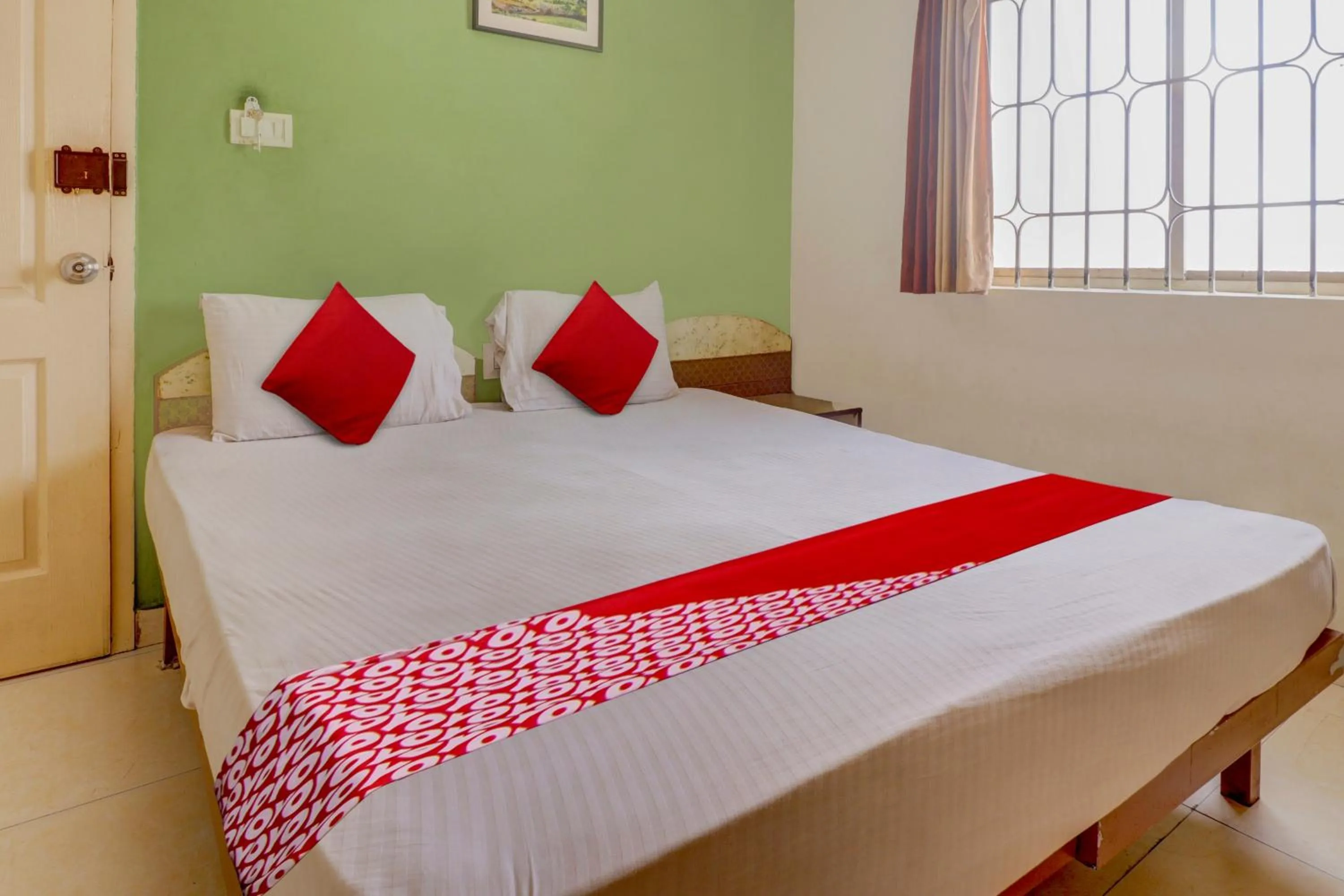 Bedroom, Bed in Hotel O Raj Comforts