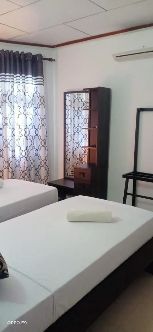 Bed in Kavee Transit Hotel