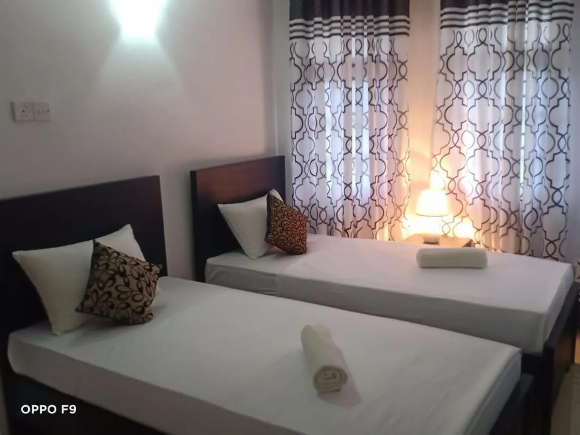 Bed in Kavee Transit Hotel