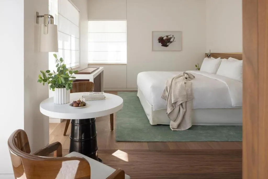 Bed in R48 Hotel and Garden