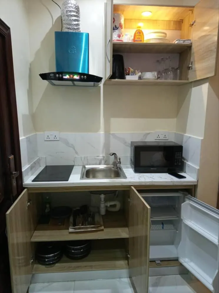 Kitchen or kitchenette in ERiTH APARTMENT & SUITES