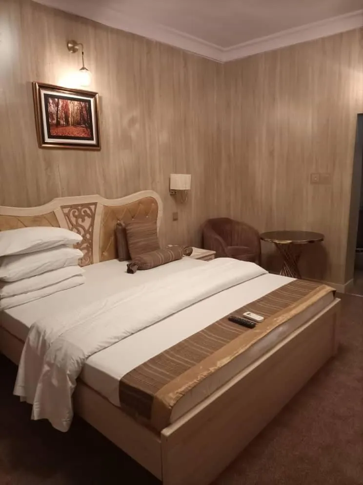 Bed in ERiTH APARTMENT & SUITES