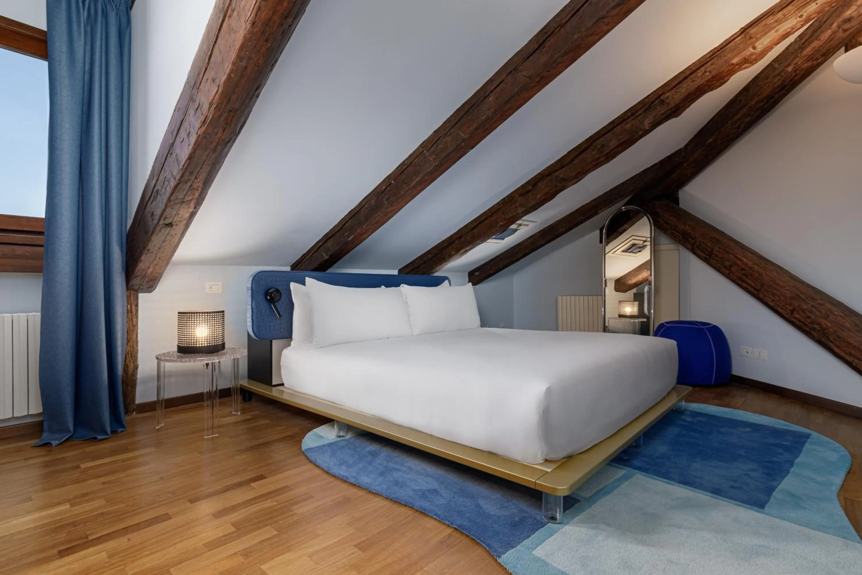 Bed in Palazzo Dei Fiori by Room Mate