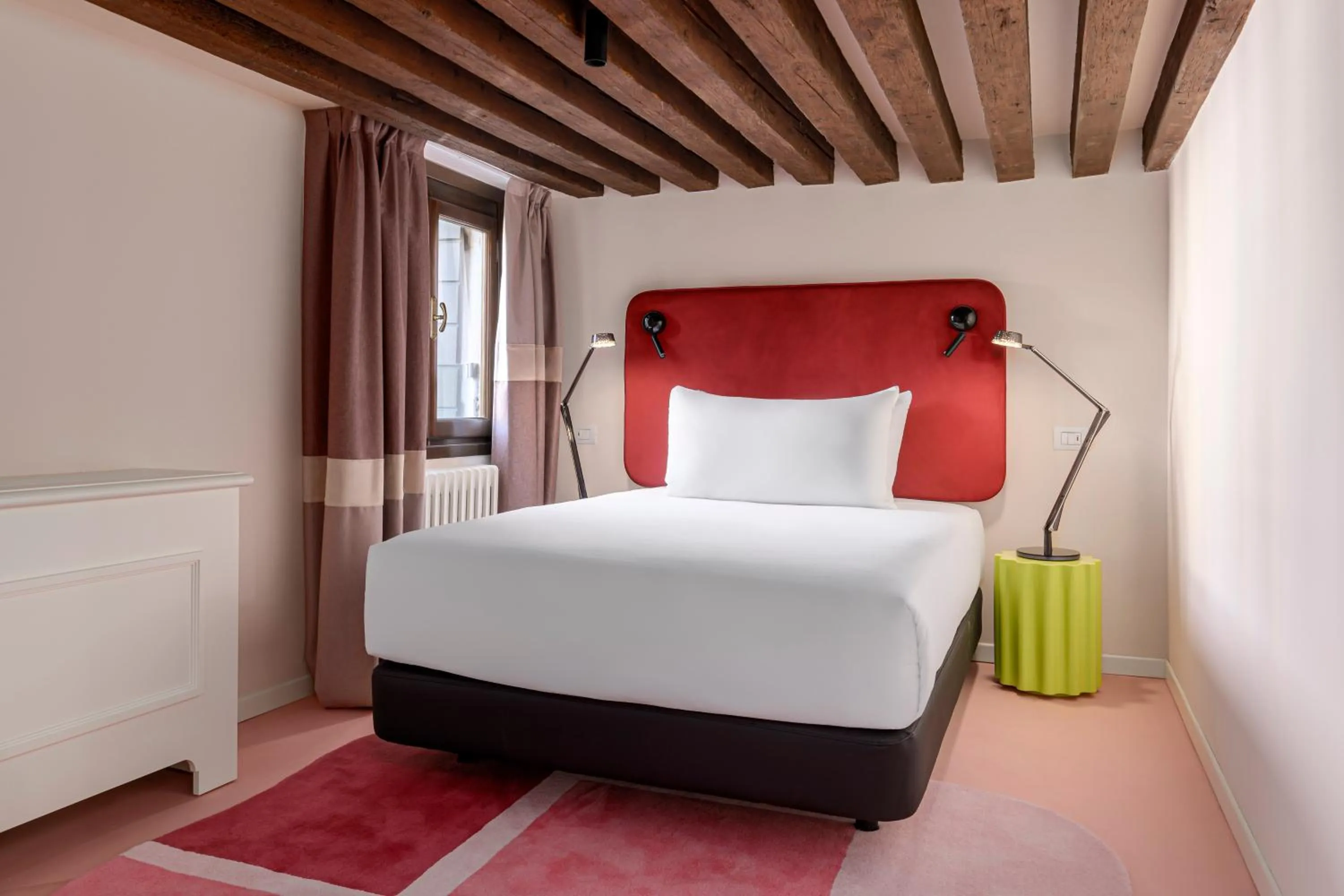 Bed in Palazzo Dei Fiori by Room Mate