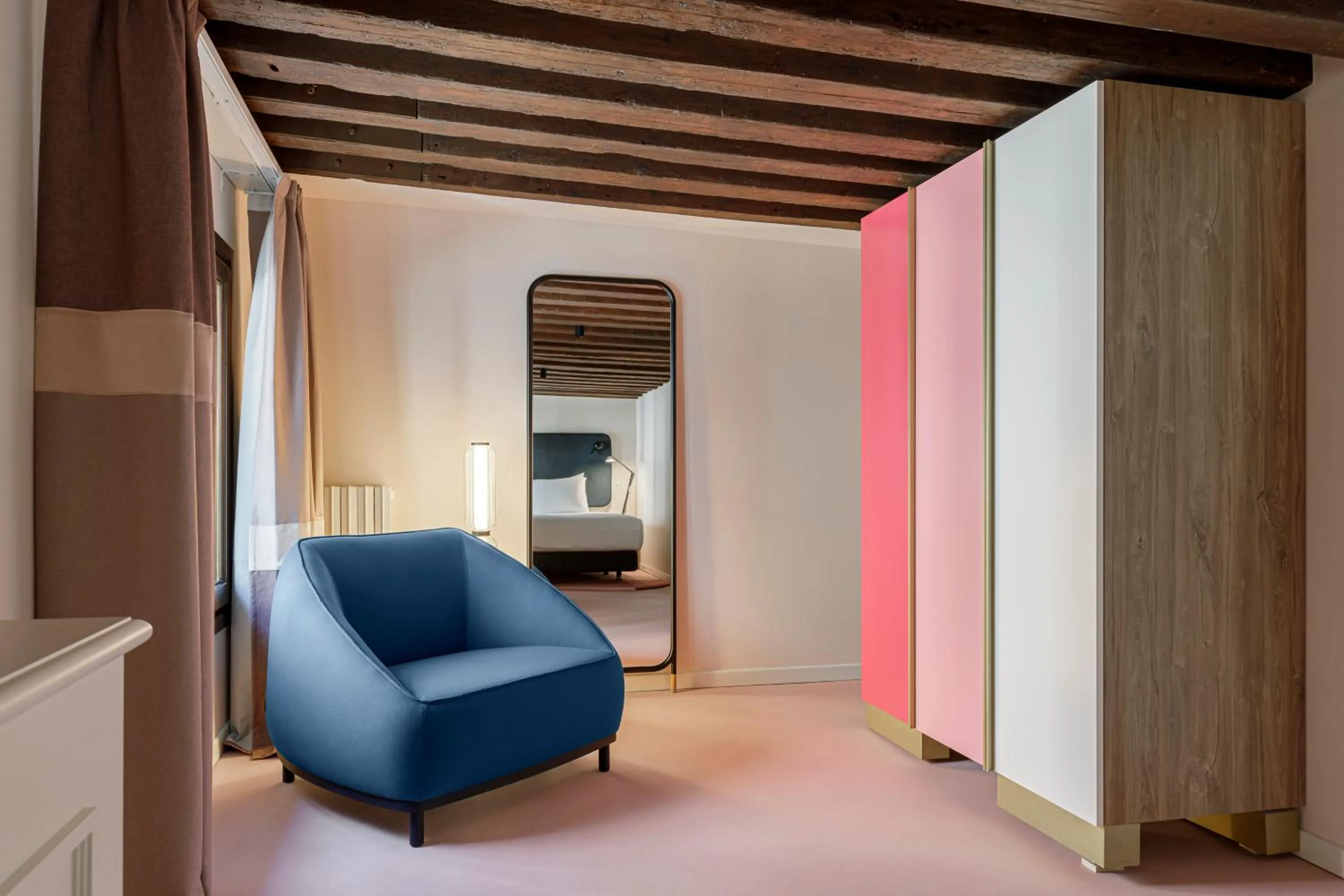 Seating area in Palazzo Dei Fiori by Room Mate