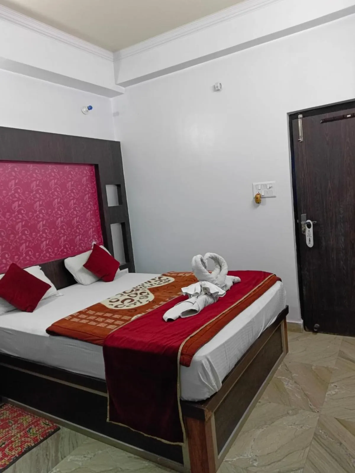 Bed in Hotel Nirmala Inn