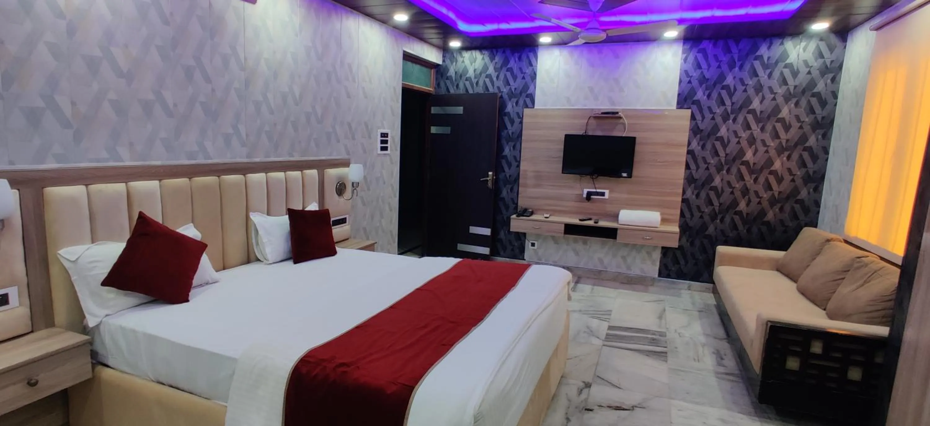 Bed in Hotel Nirmala Inn