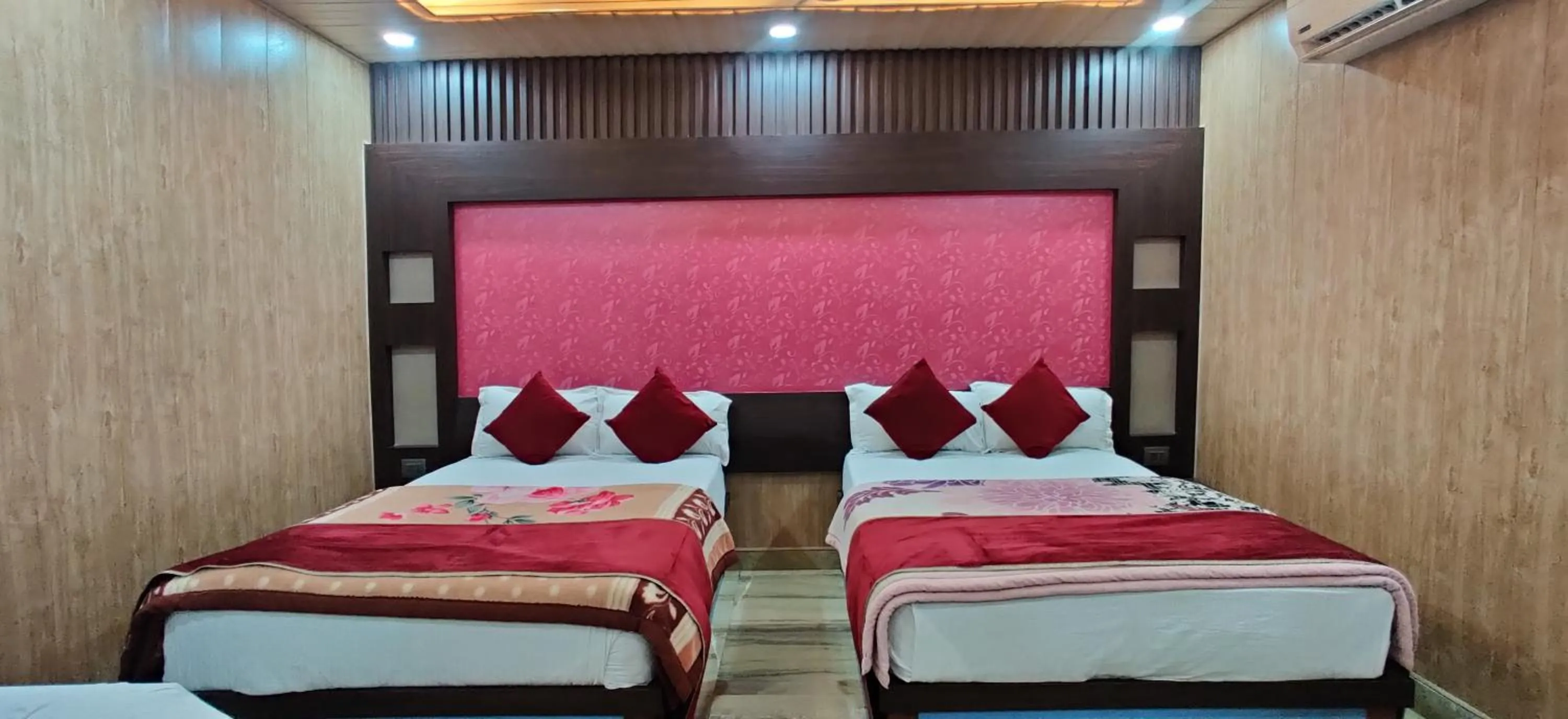 Bed in Hotel Nirmala Inn