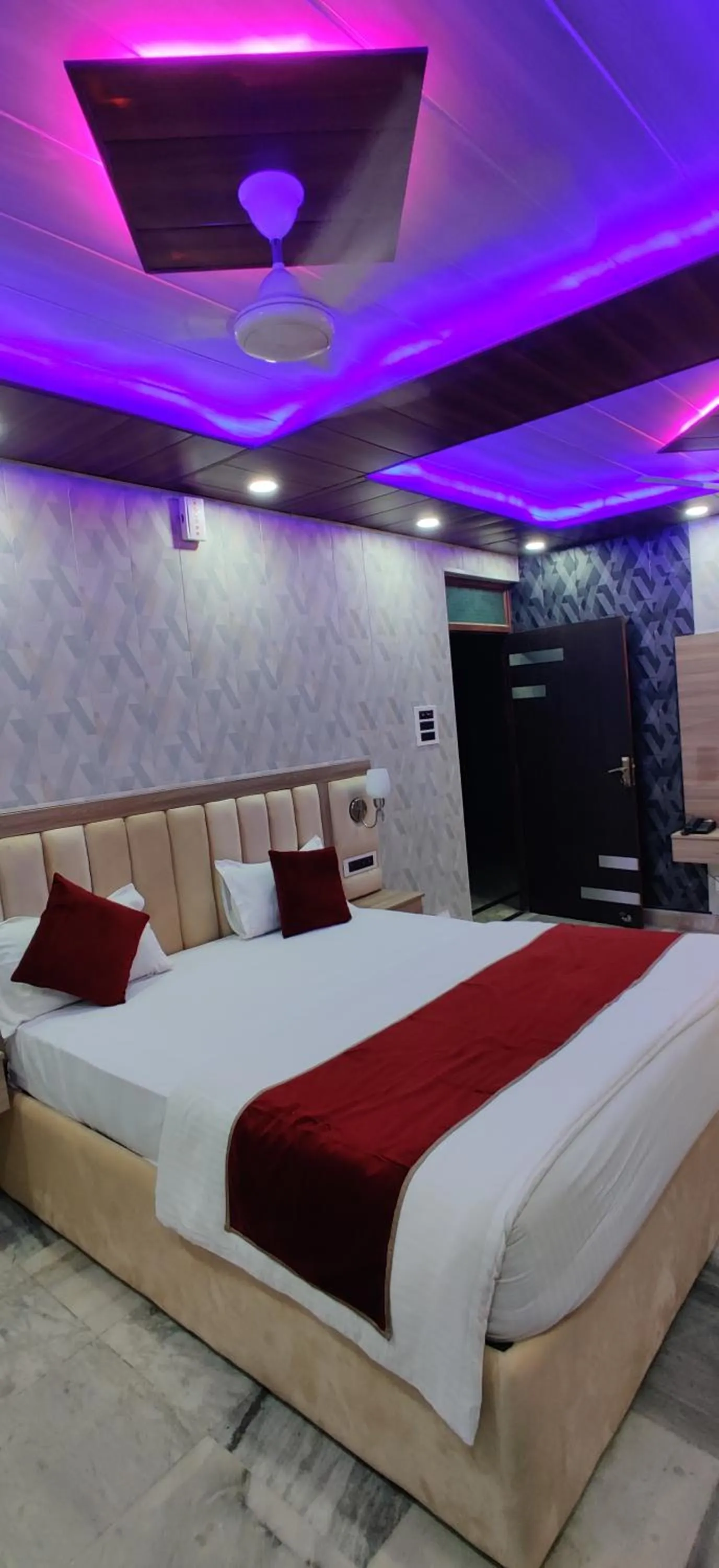 Bed in Hotel Nirmala Inn