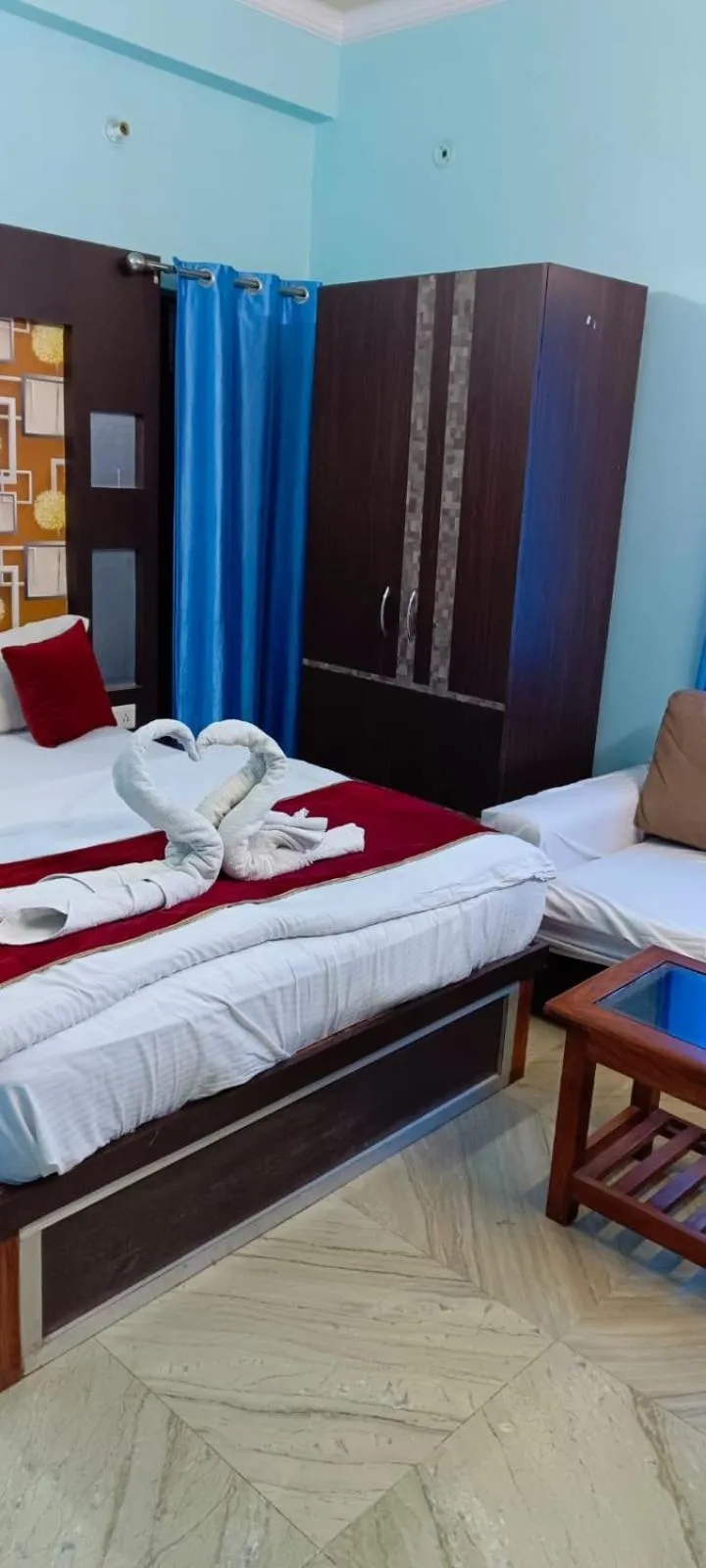 Bed in Hotel Nirmala Inn