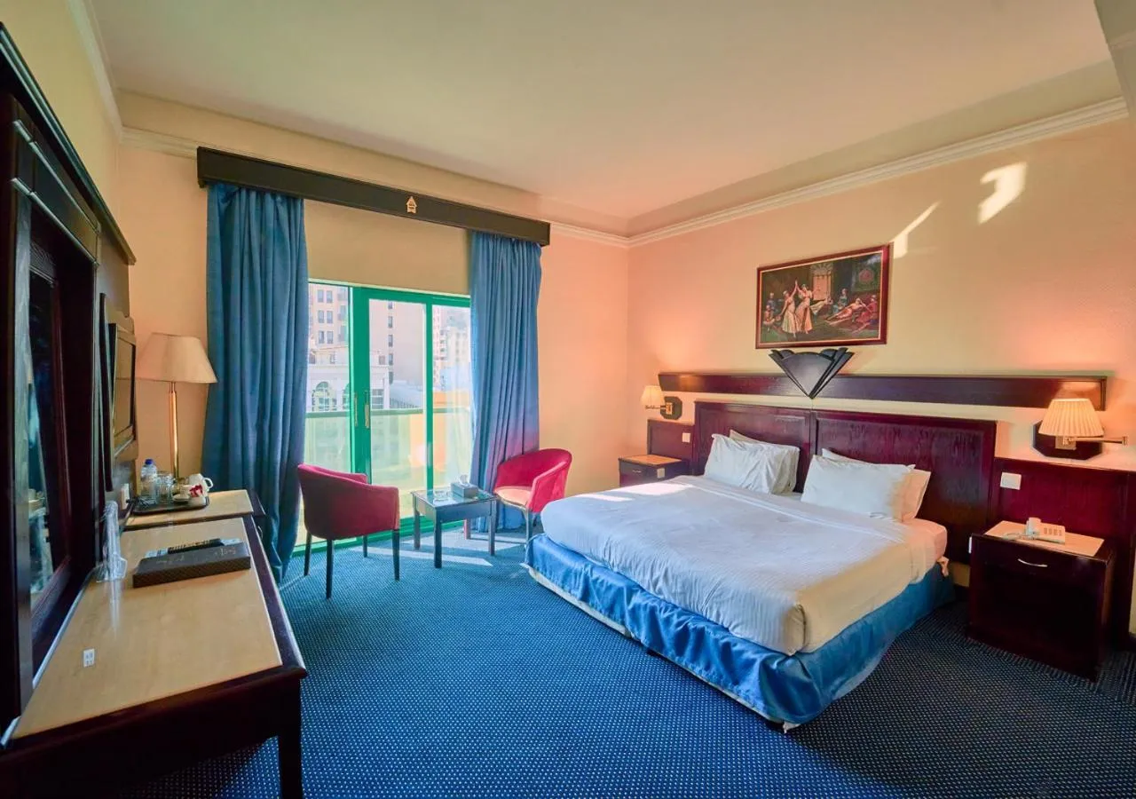 Bed in Claridge Hotel Dubai