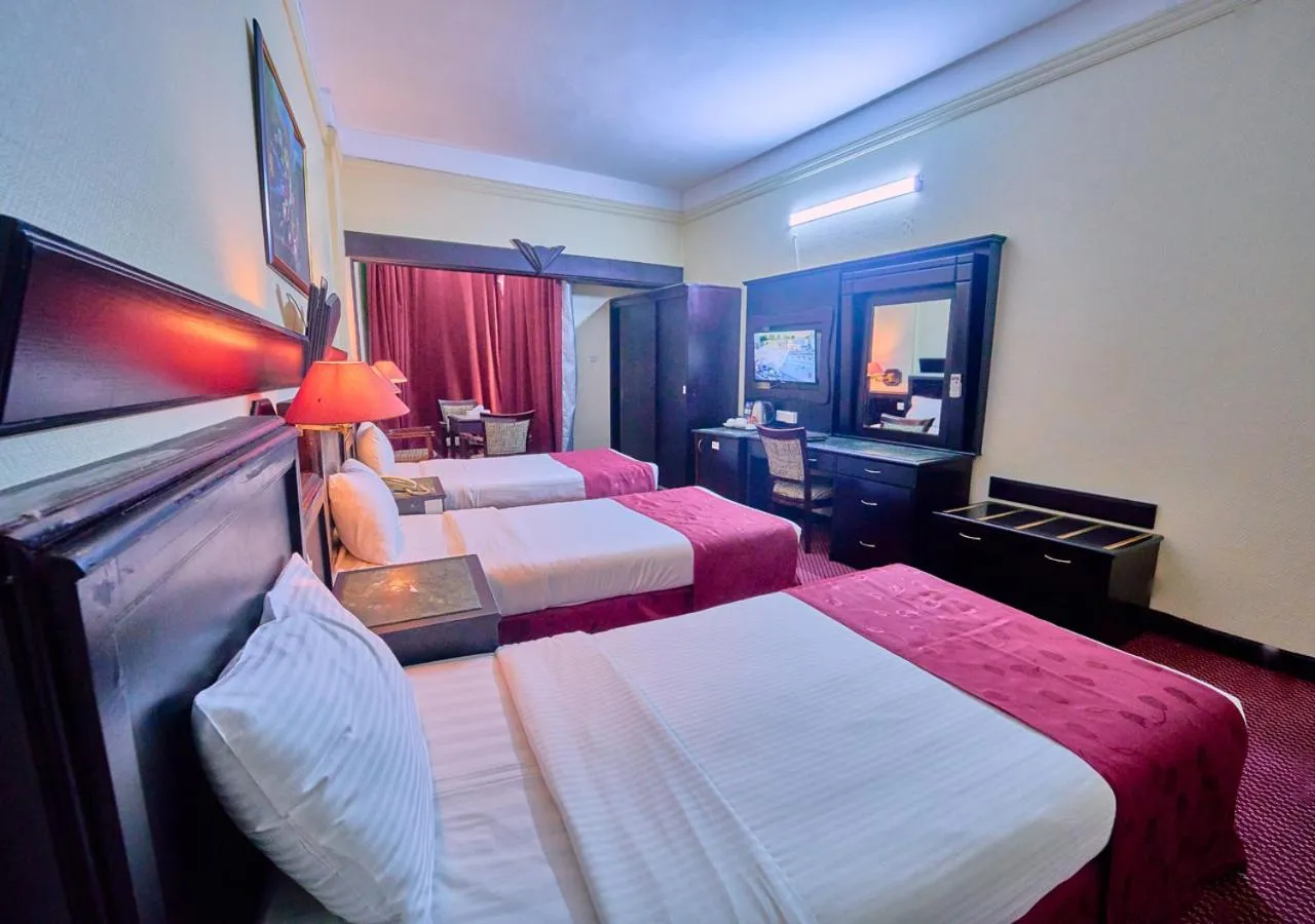 Bed in Claridge Hotel Dubai