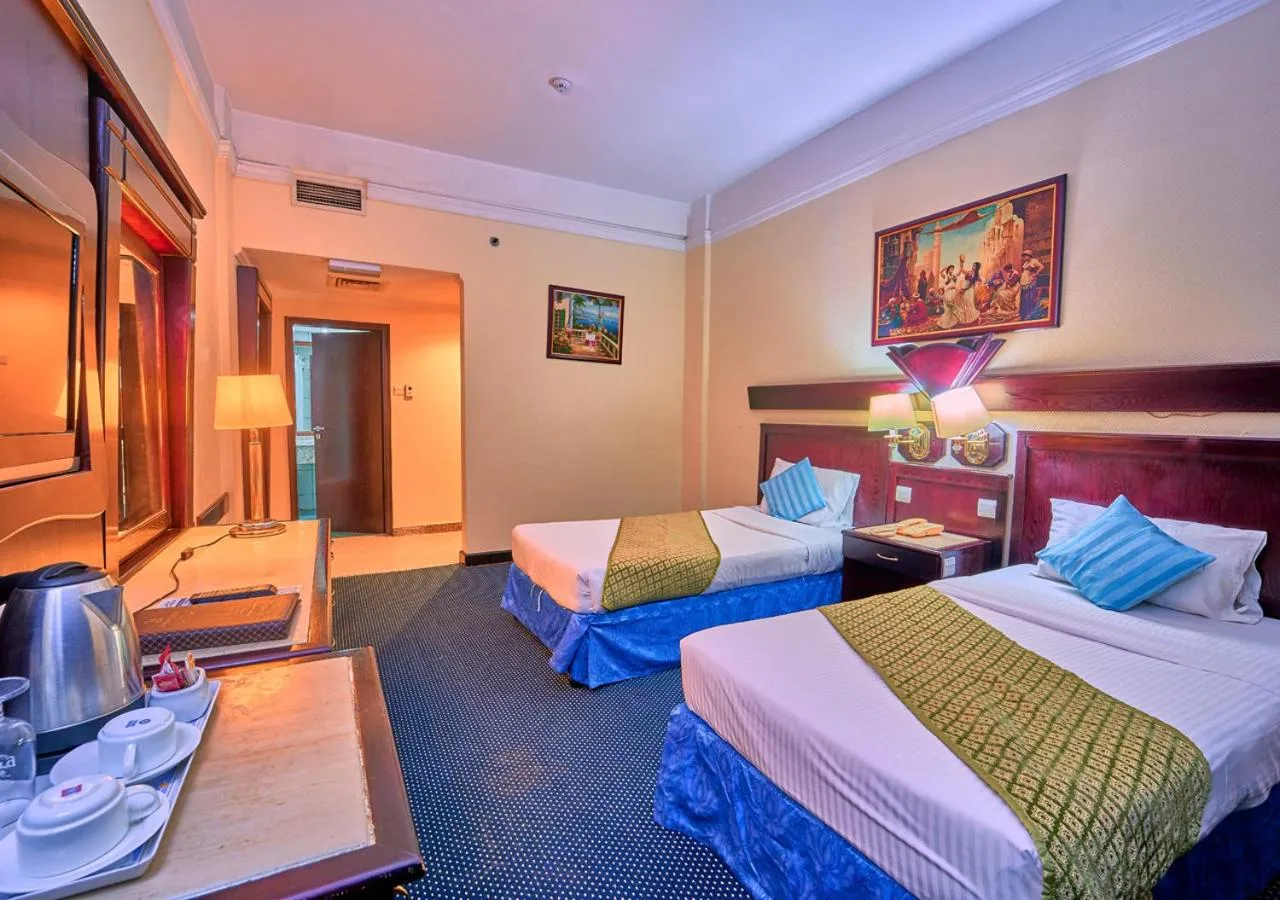 Bed in Claridge Hotel Dubai