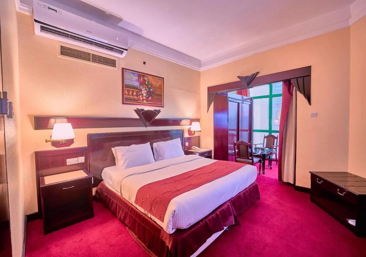 Bed in Claridge Hotel Dubai