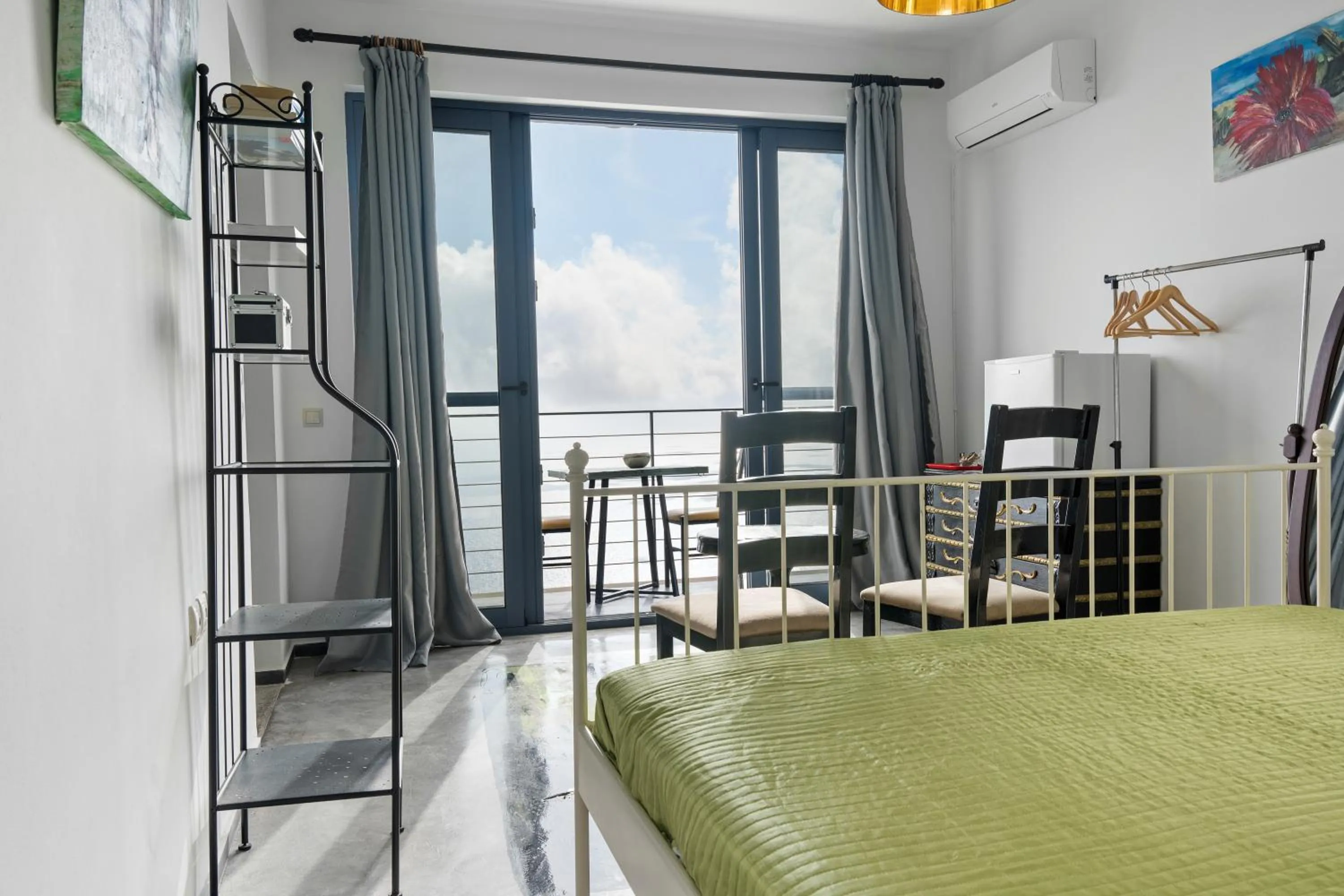 Bed in Serenity Boutique Suites