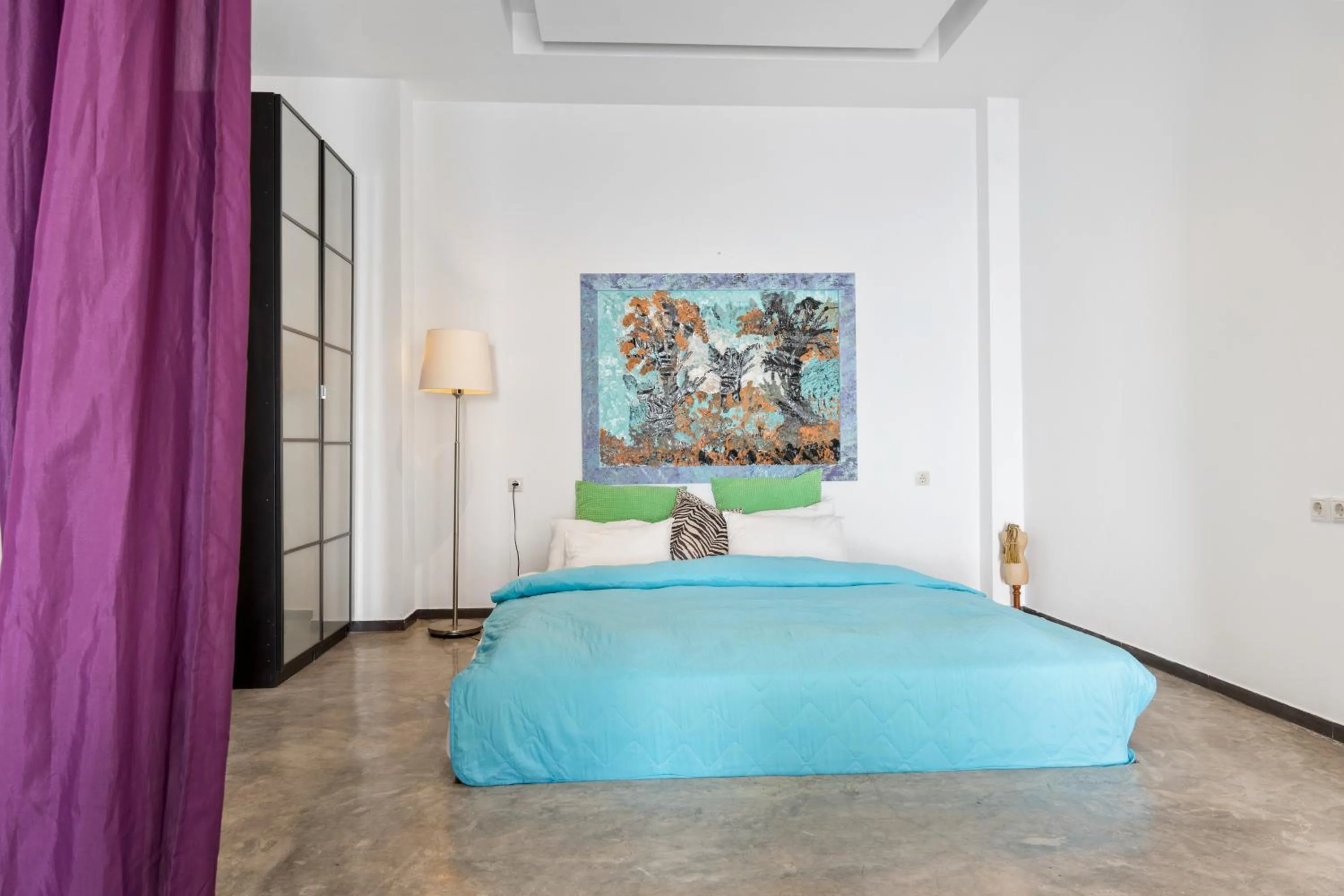 Bed in Serenity Boutique Suites