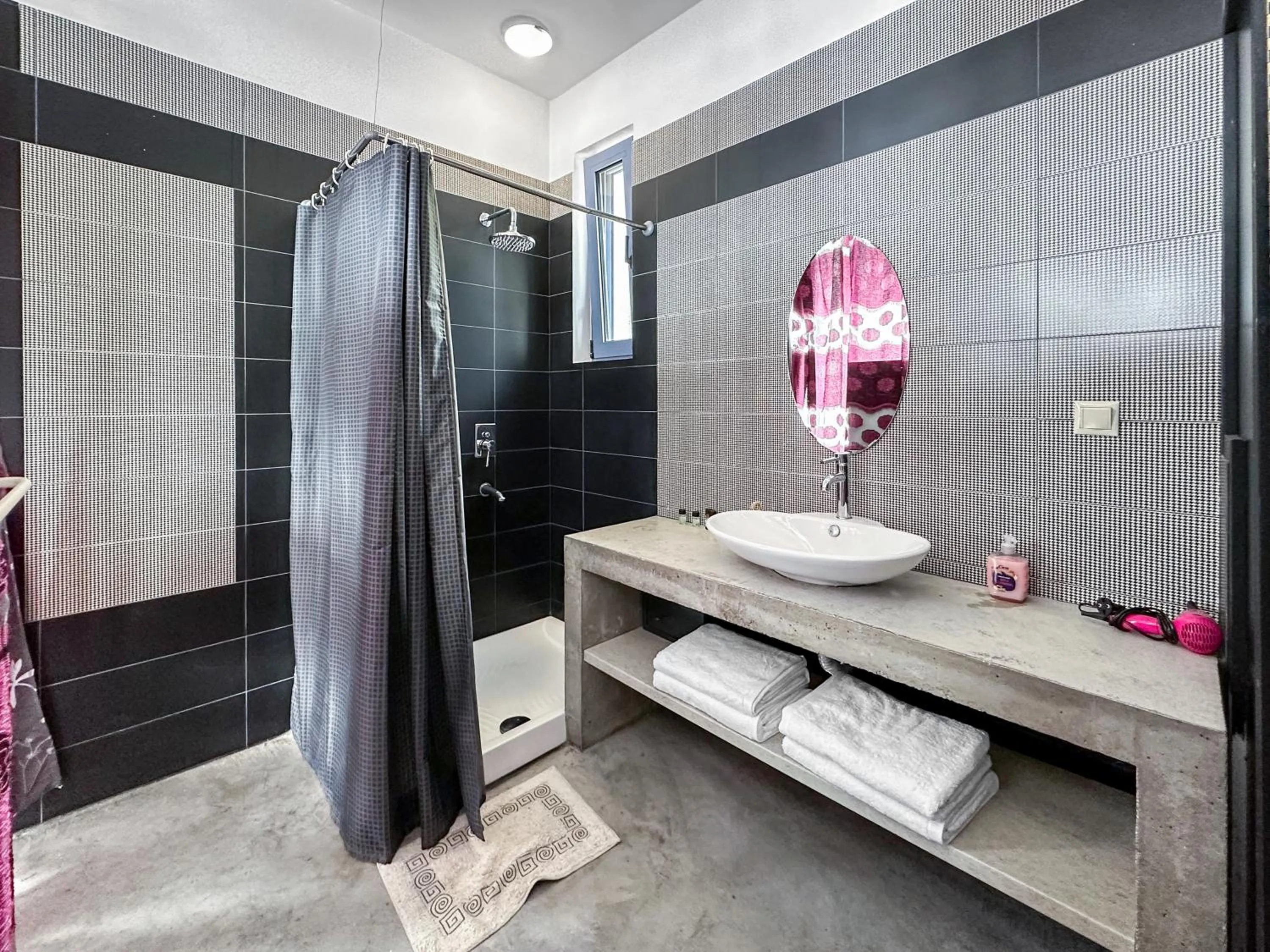 Shower in Serenity Boutique Suites