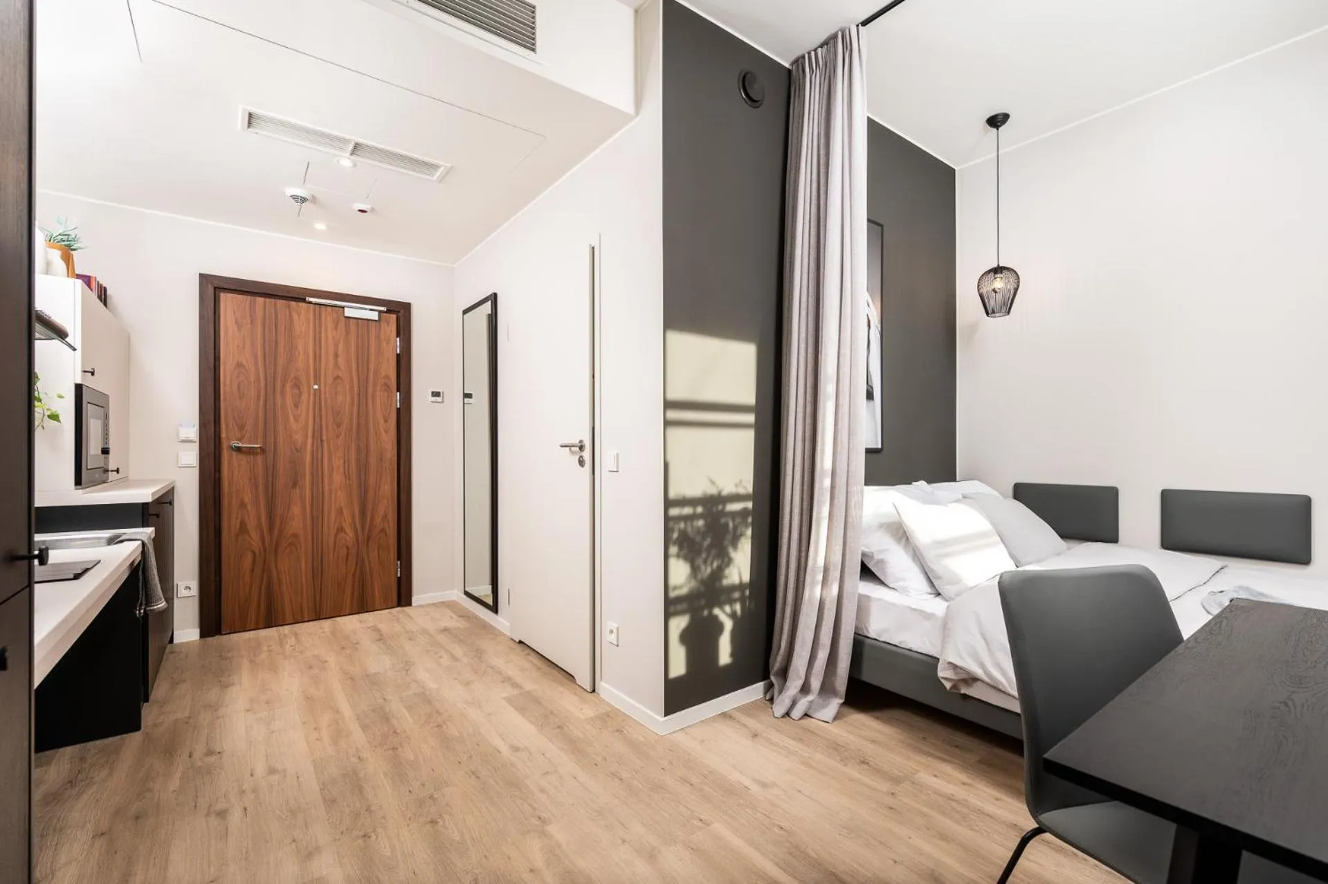 Photo of the whole room in MILESTONE Krakow Center Urban Living