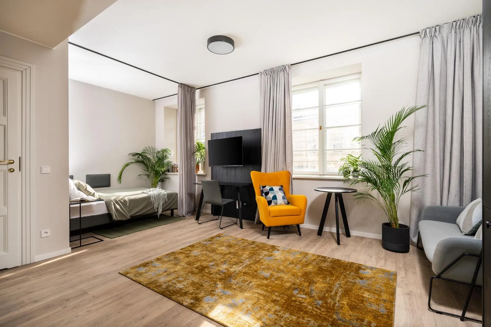 Photo of the whole room in MILESTONE Krakow Center Urban Living