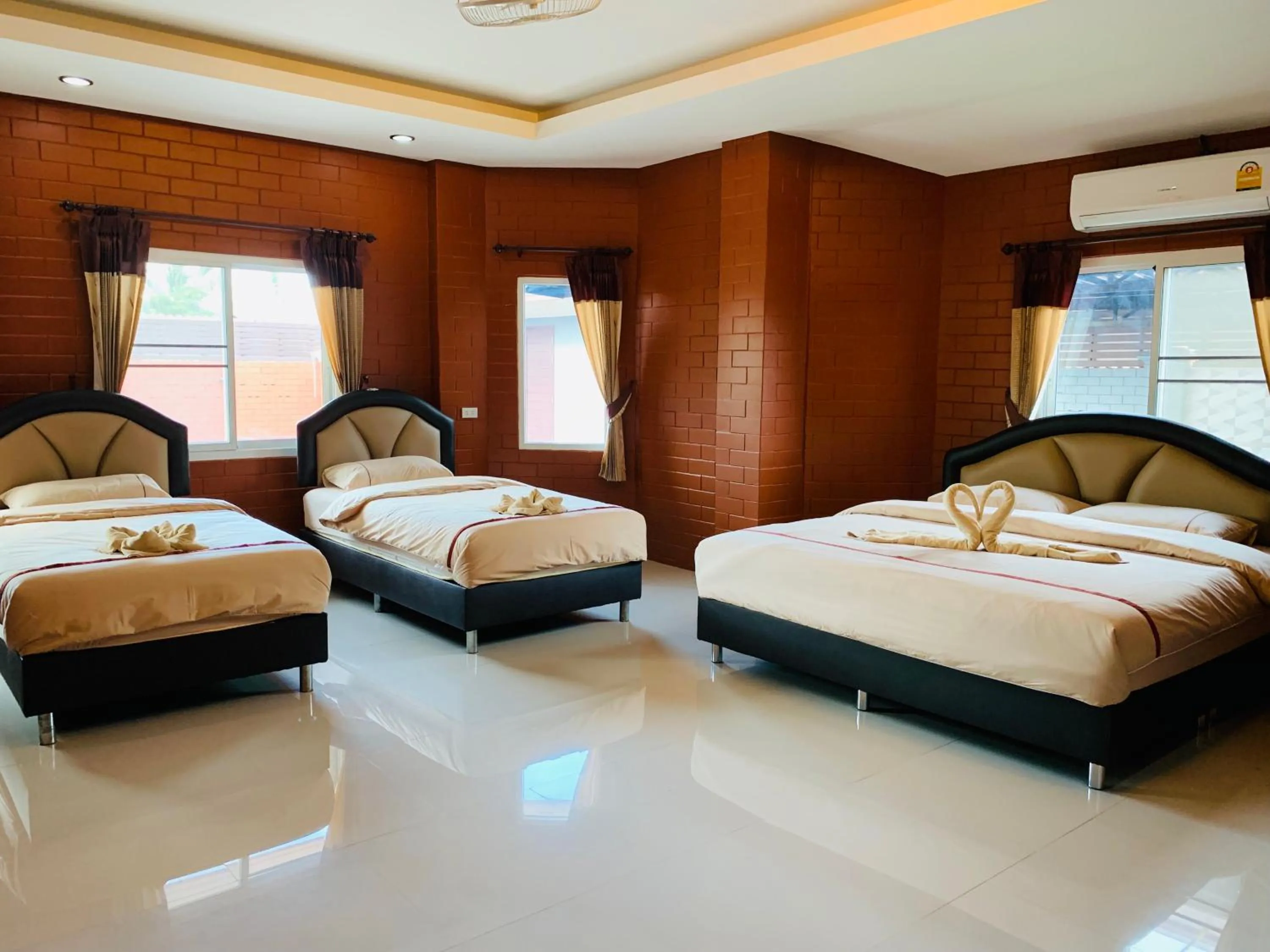 Bed in Benwadee Resort Pattaya