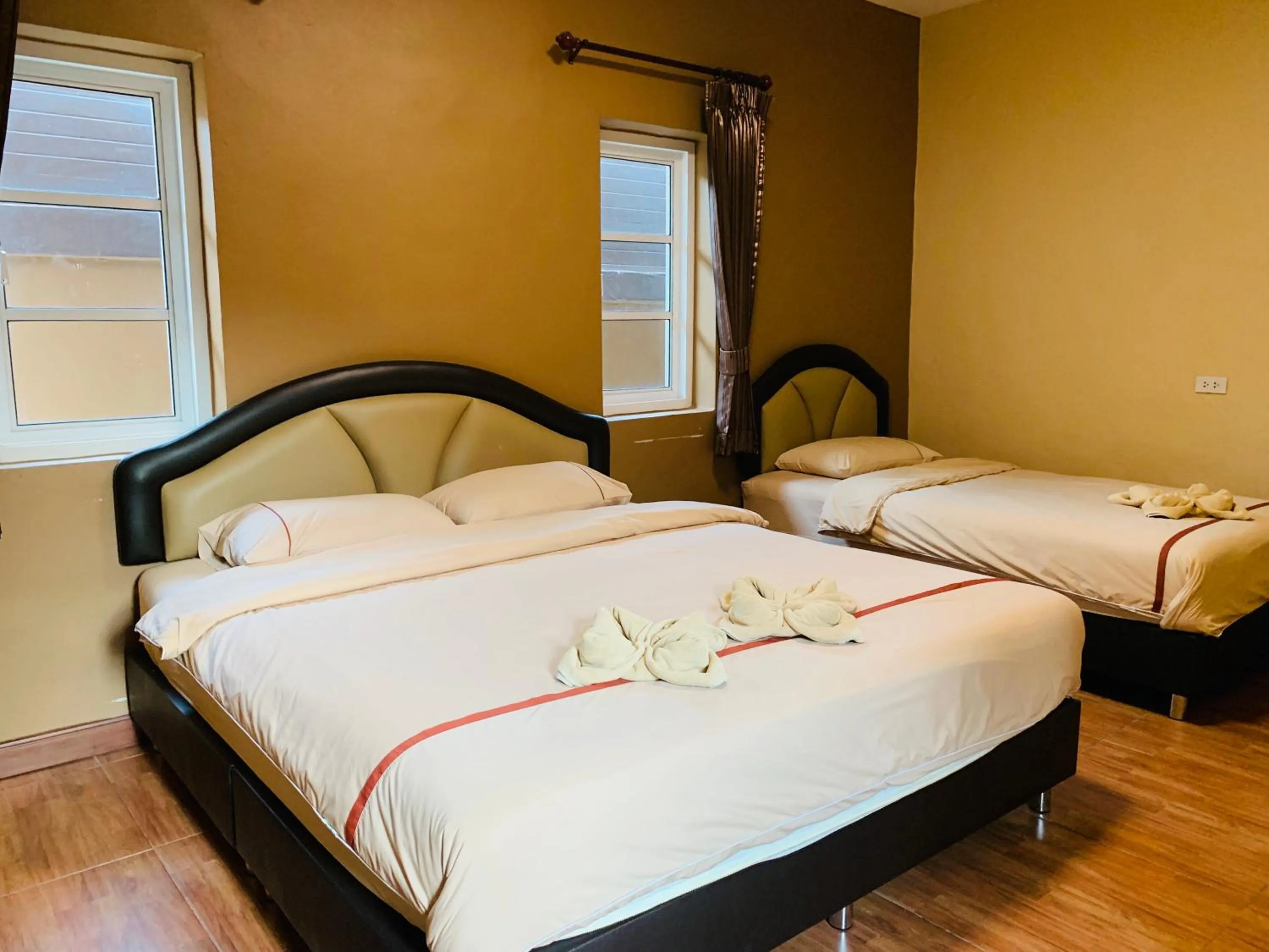 Bed in Benwadee Resort Pattaya