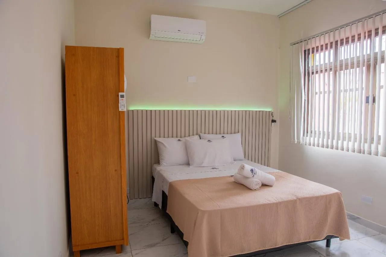 Bed in Pousada Sol da Enseada Guarujá Inn - Piscina Aquecida