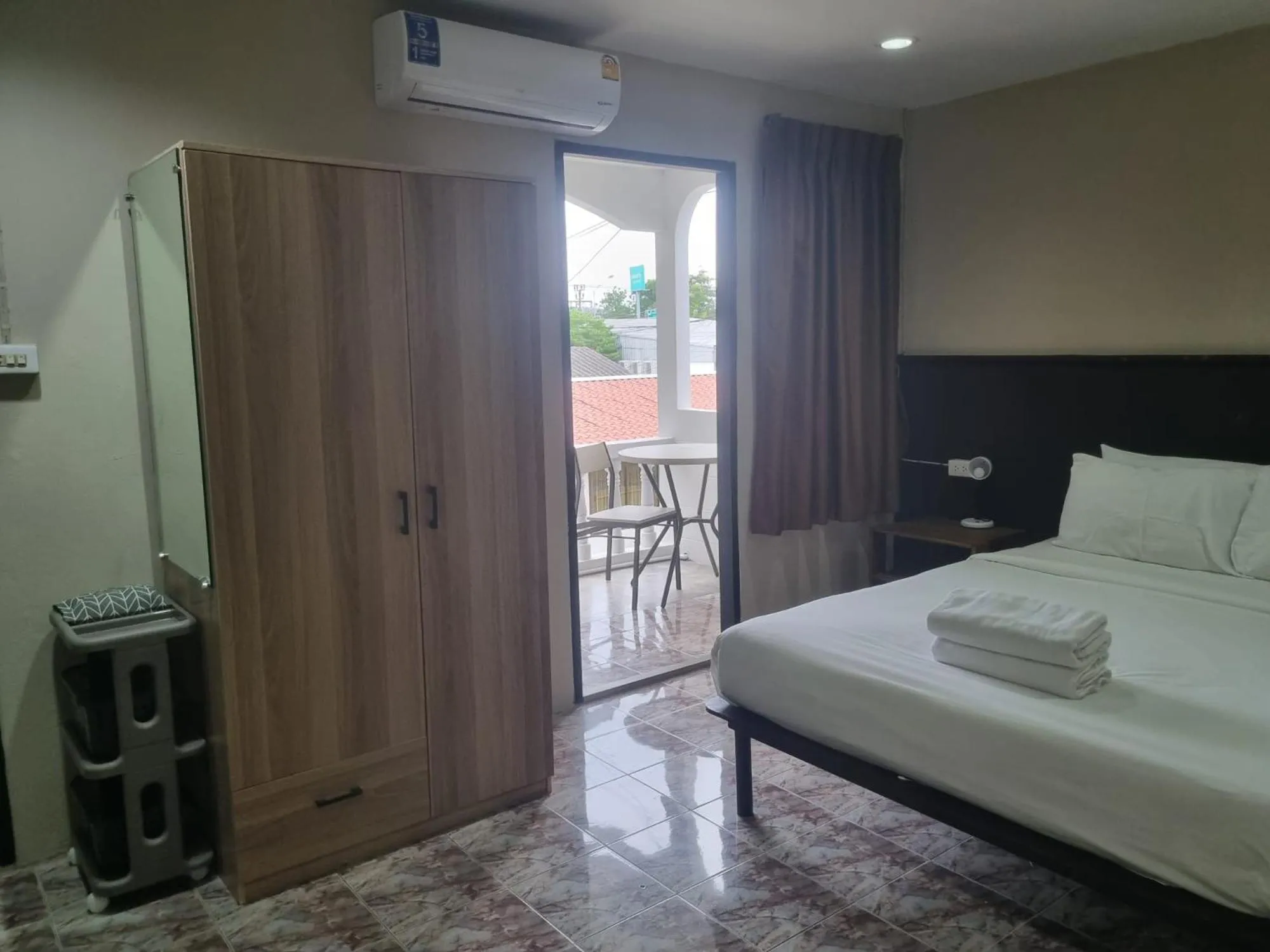 Bed in New Breakers Hotel Rawai