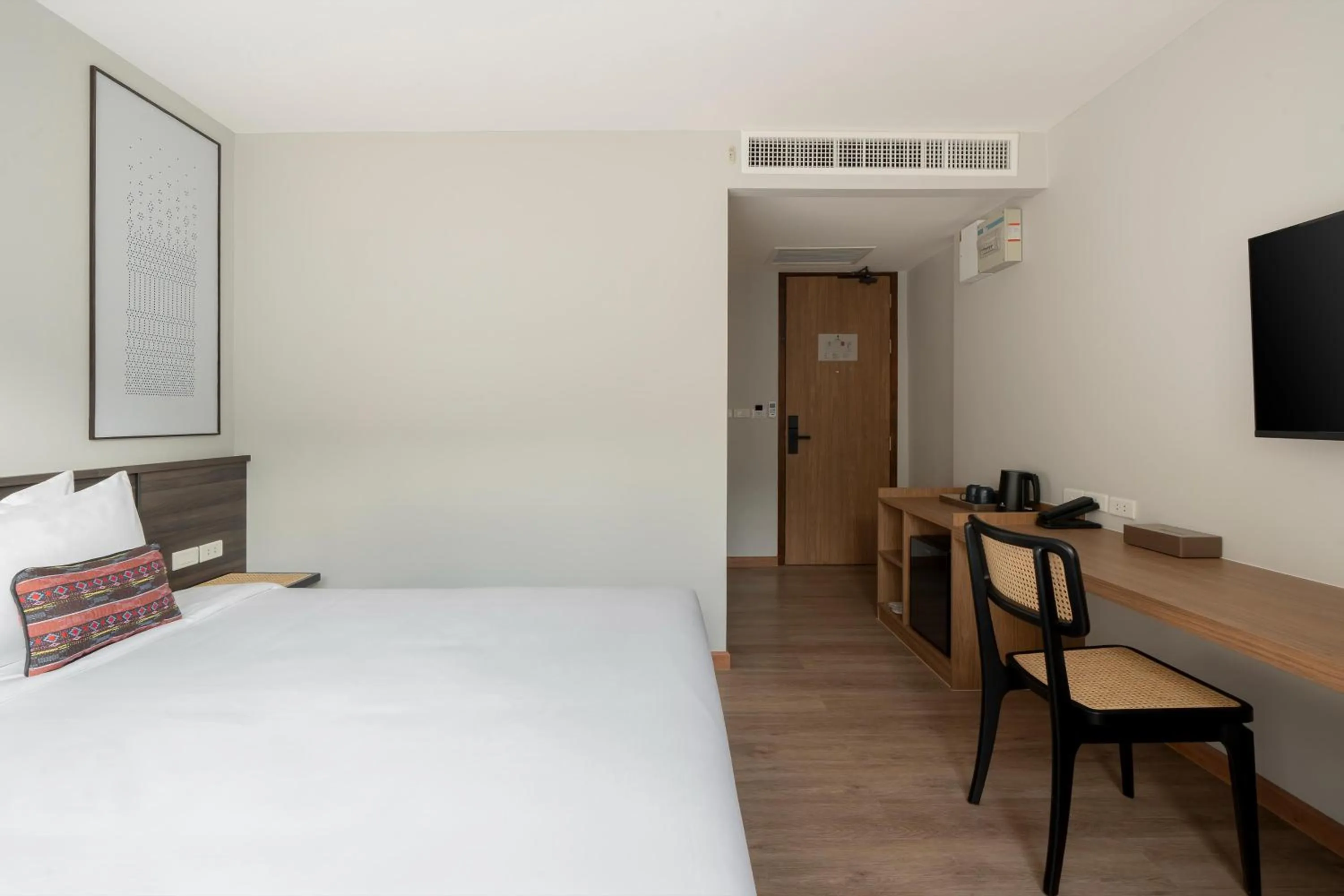 Bed in Pranakorn Heritage Hotel