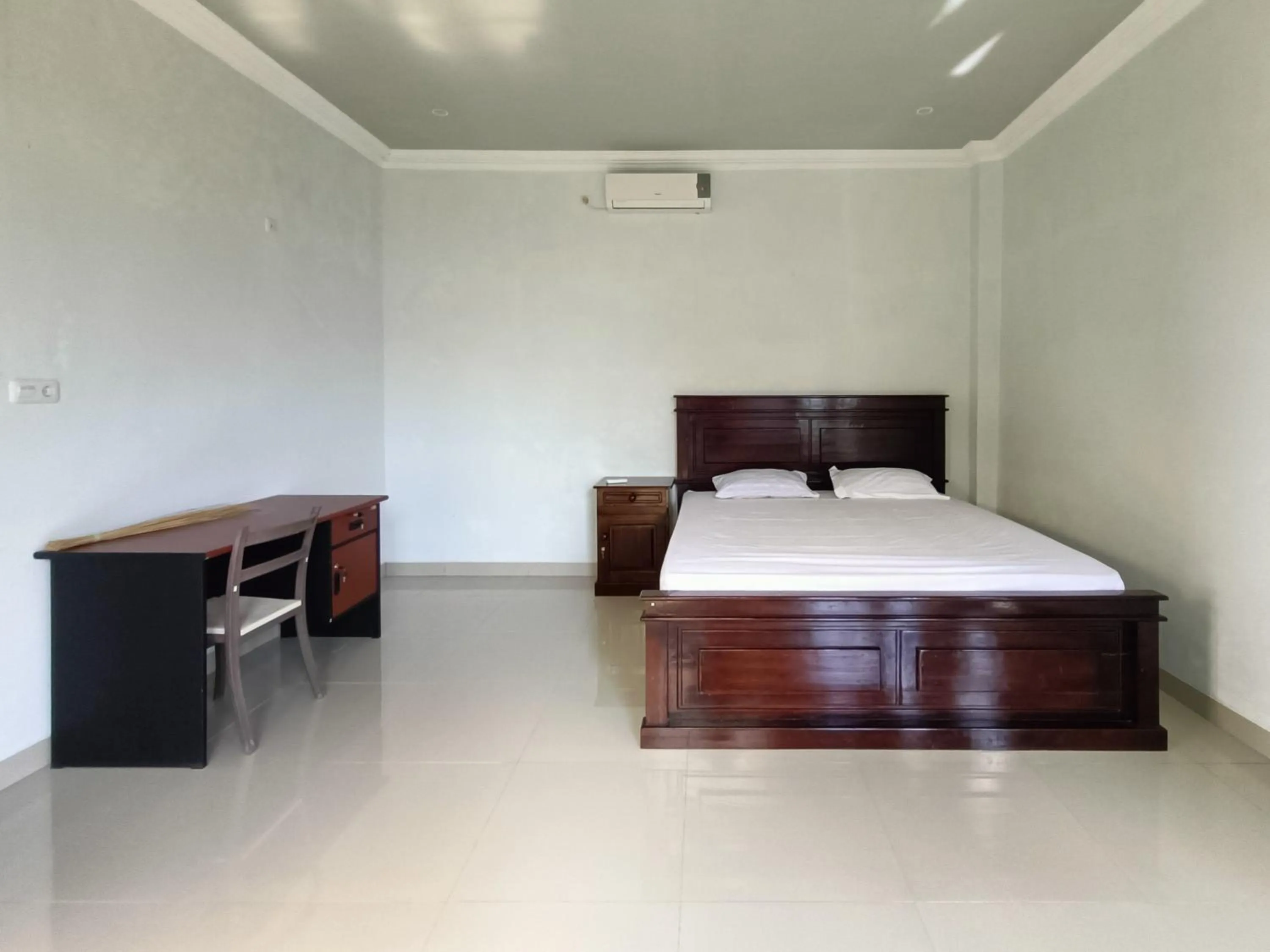 Bed in RedDoorz @ Green Homestay Syariah Baubau