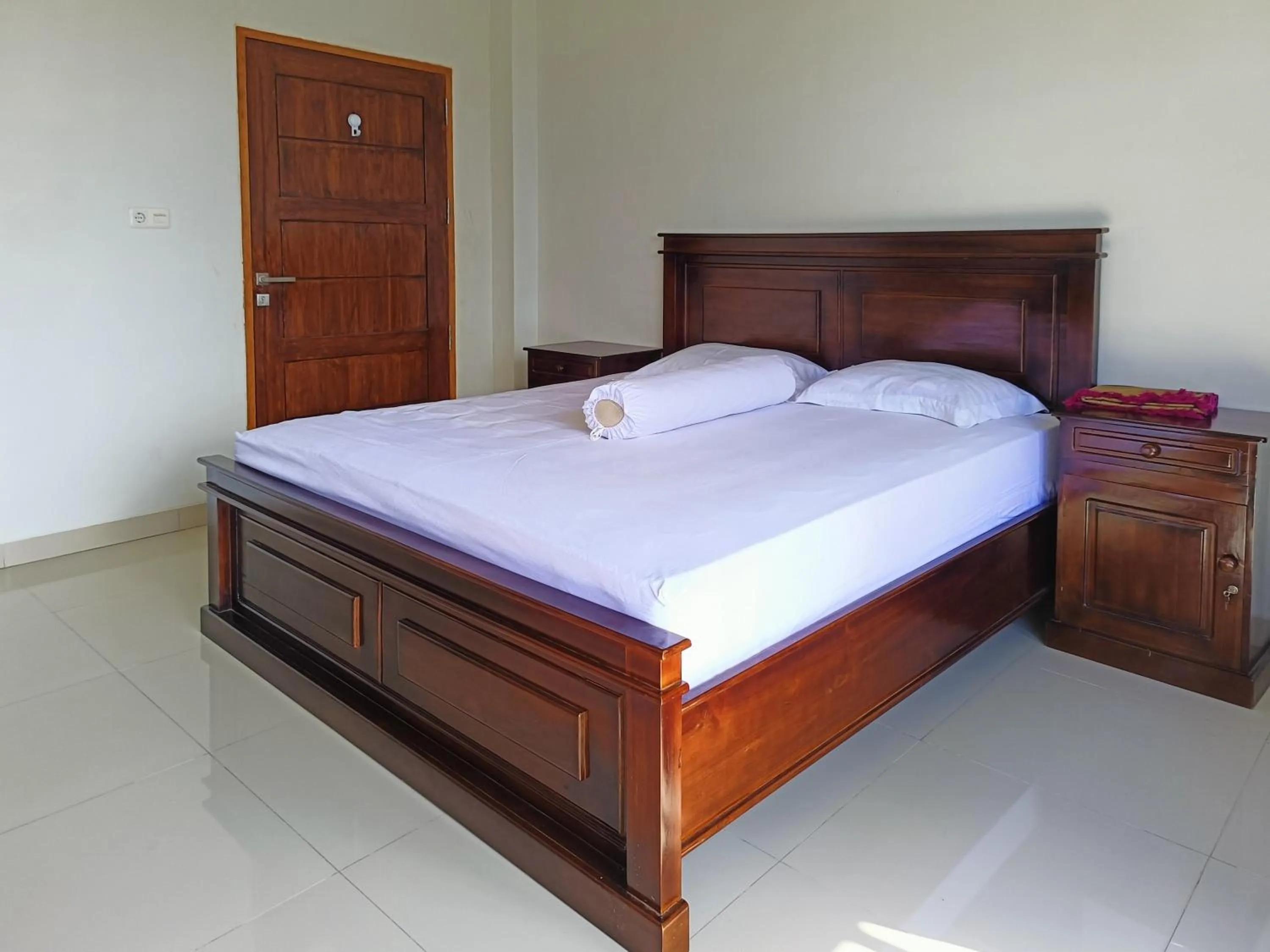 Bed in RedDoorz @ Green Homestay Syariah Baubau