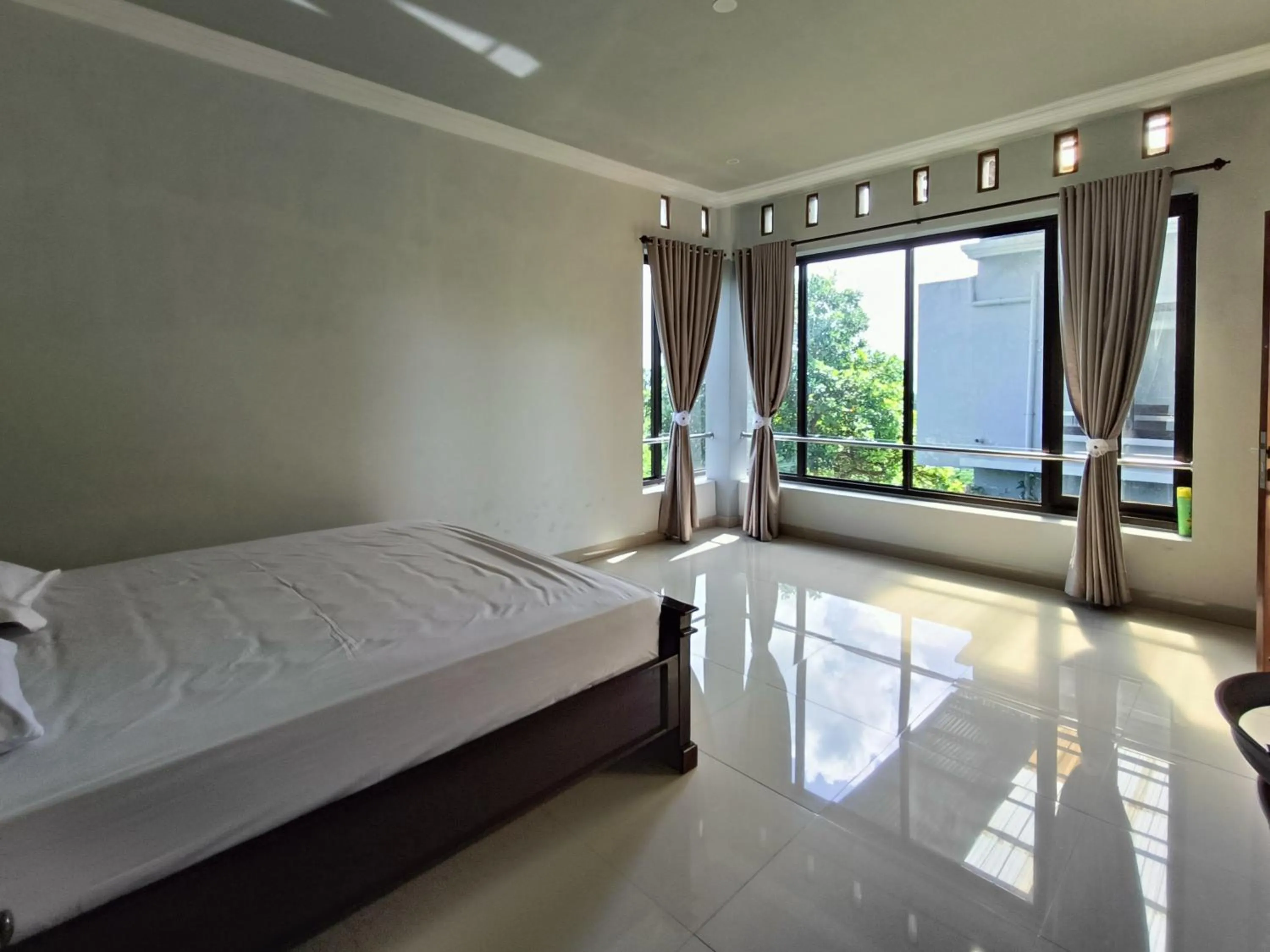 Bed in RedDoorz @ Green Homestay Syariah Baubau