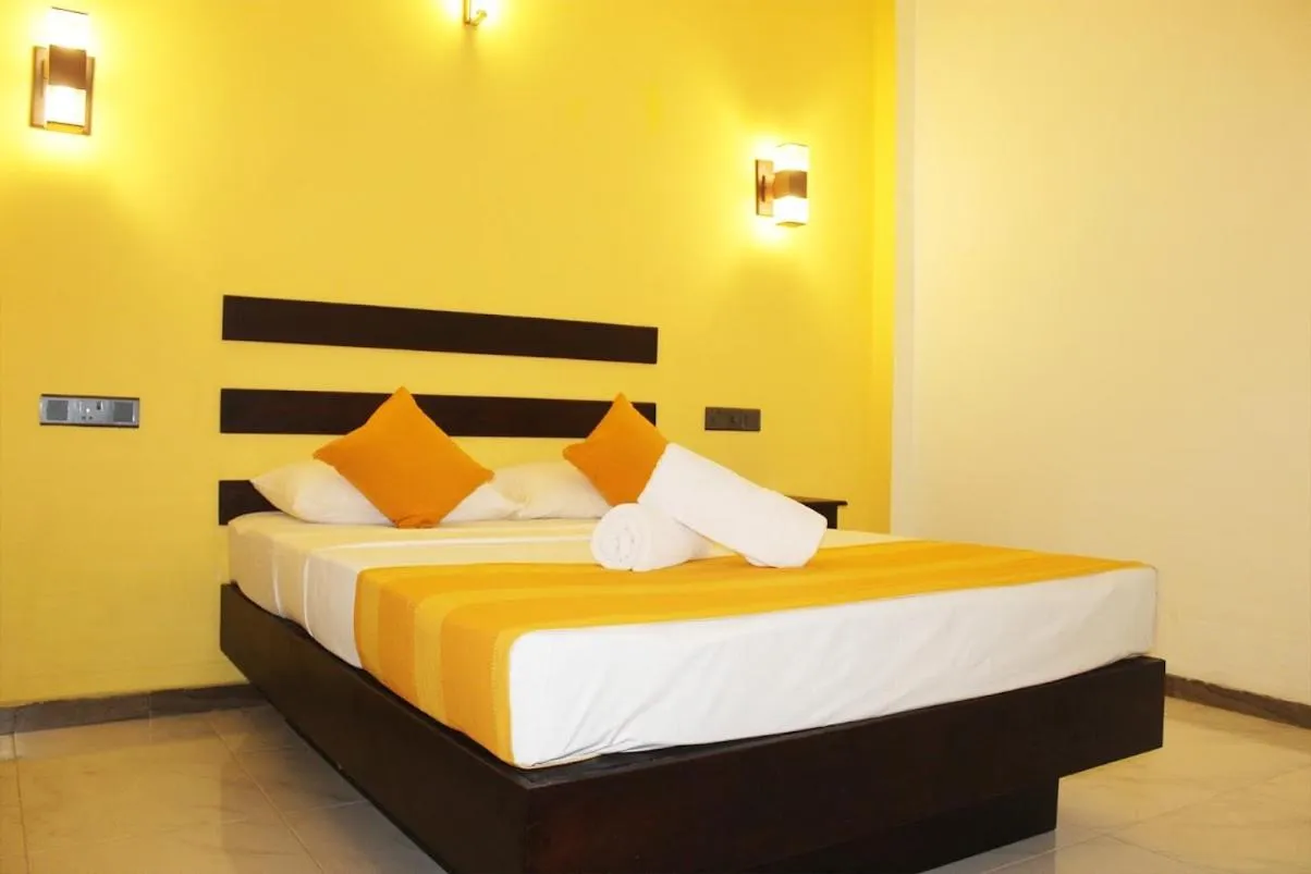 Bed in AMRON RESORT SIGIRIYA