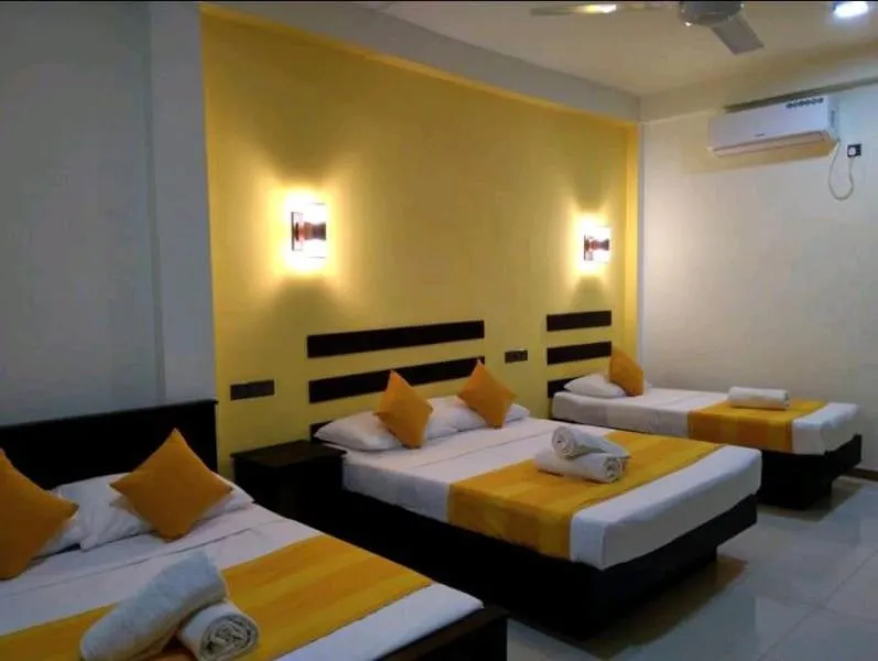 Bed in AMRON RESORT SIGIRIYA