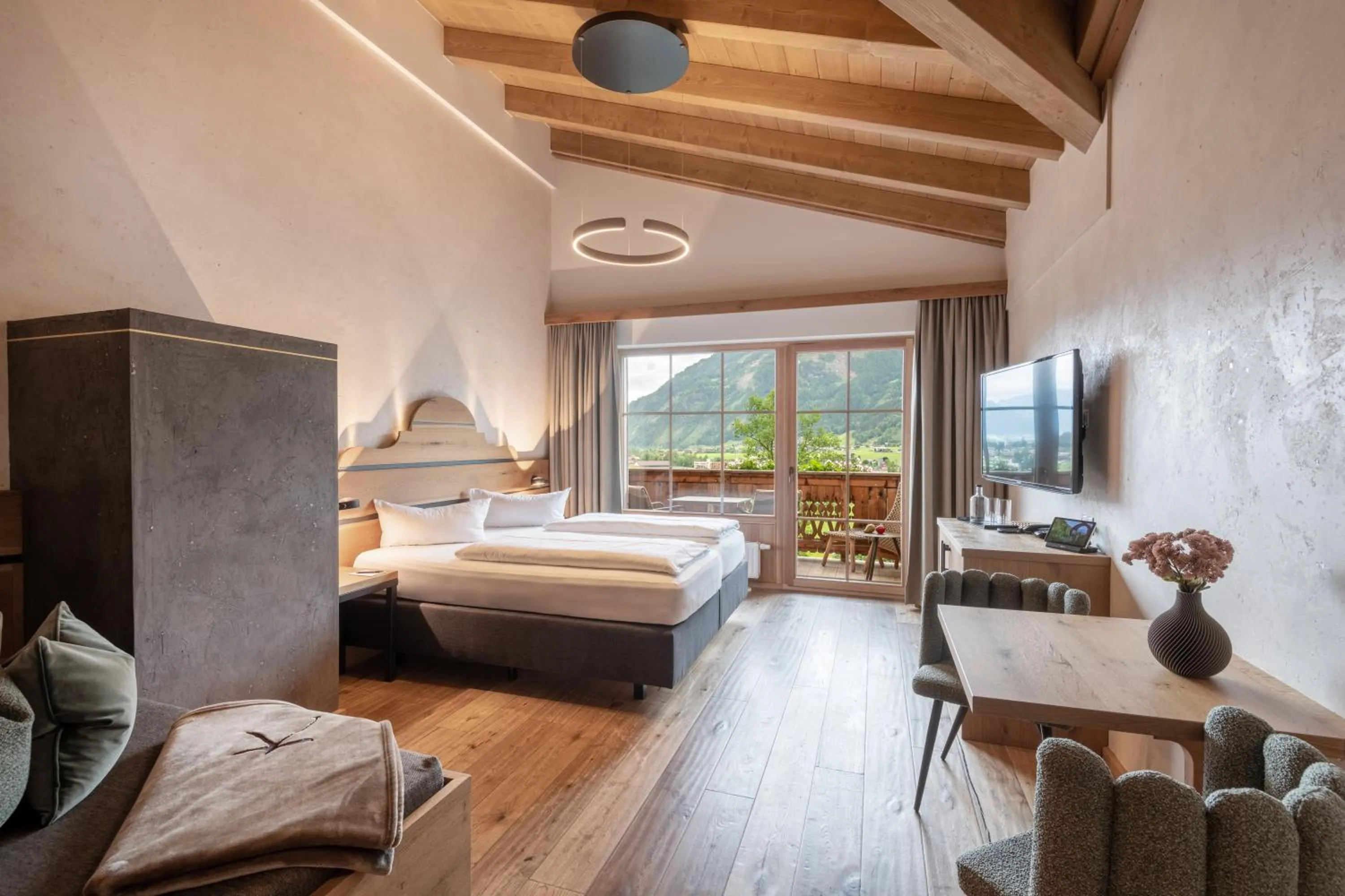Photo of the whole room, Bed in Das Kaltenbach - ApartHotel